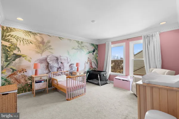 a room with furniture and a large window