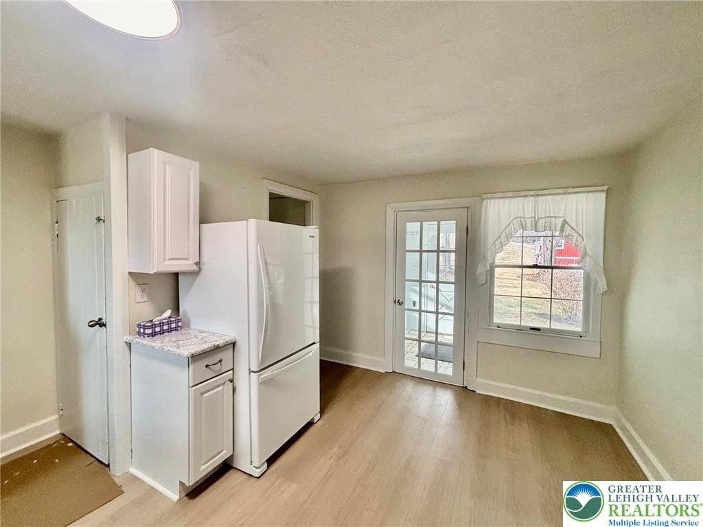 6024 Front Street Bangor, PA 18013 - Photo 4 of 12 a kitchen with stainless steel appliances a refrigerator and a stove