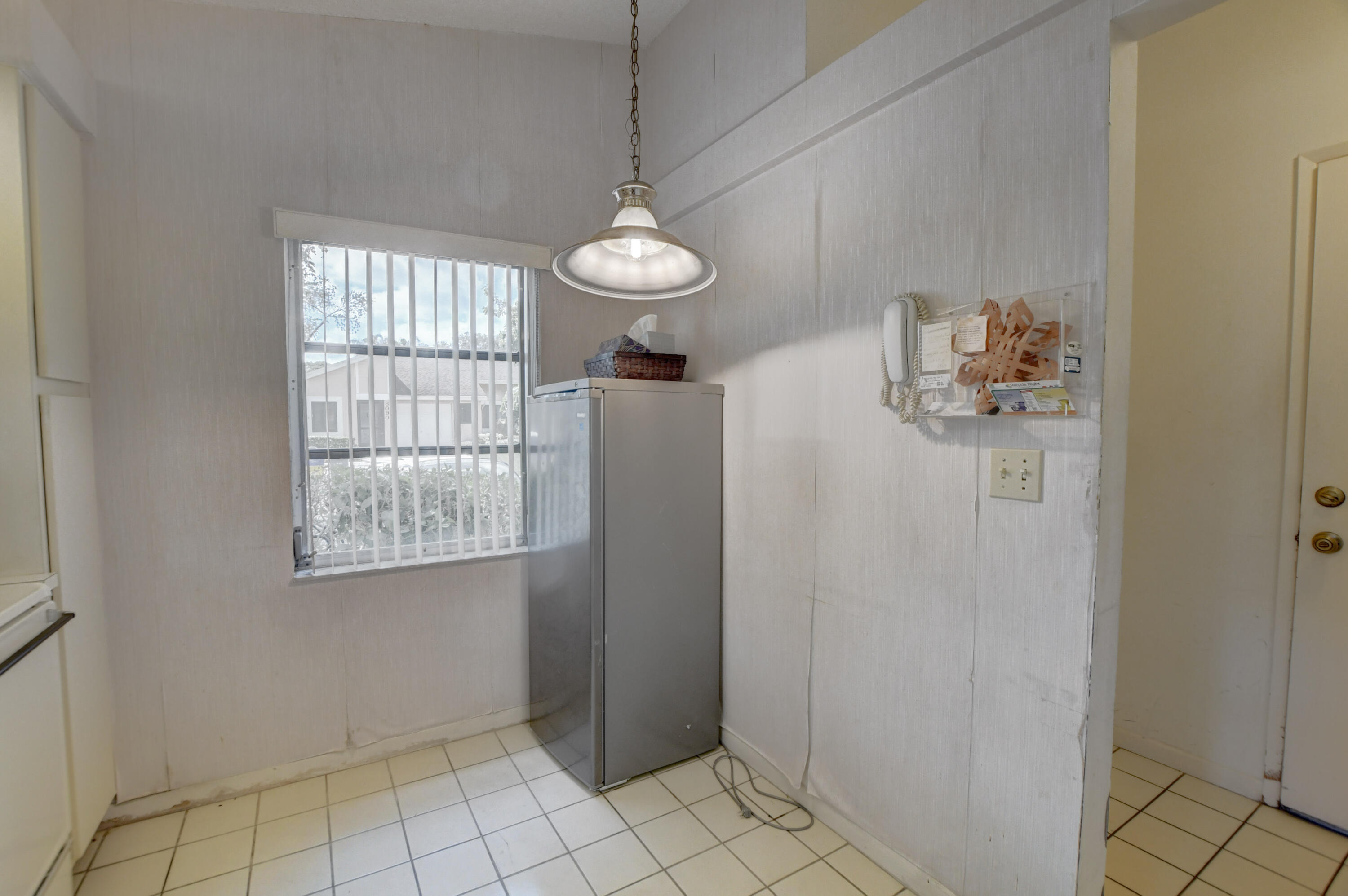 8089 Springtree Road Boca Raton, FL 33496 - Photo 13 of 44 a view of an entryway with wooden floor