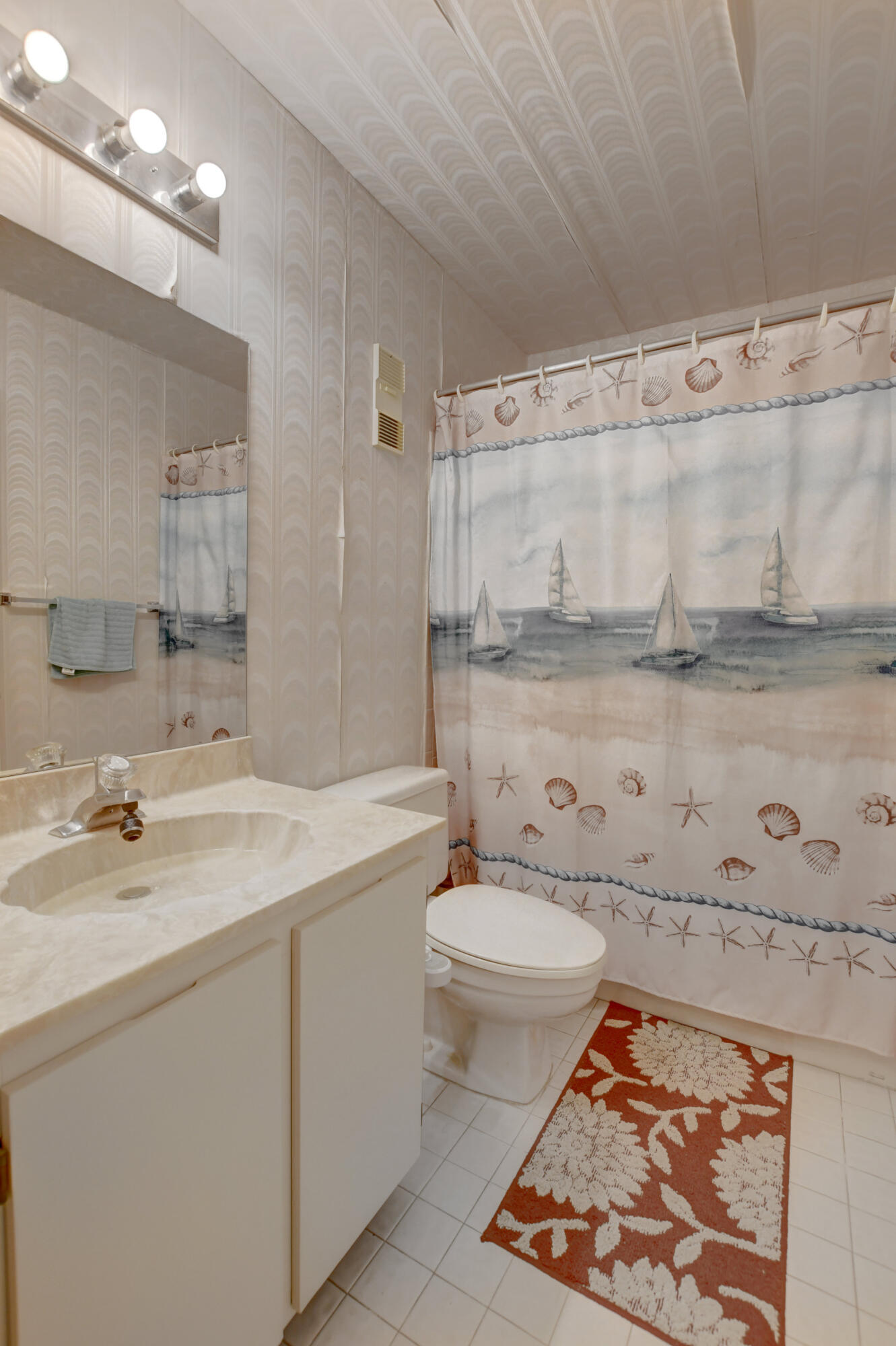 8089 Springtree Road Boca Raton, FL 33496 - Photo 25 of 44 a bathroom with a sink a toilet and shower
