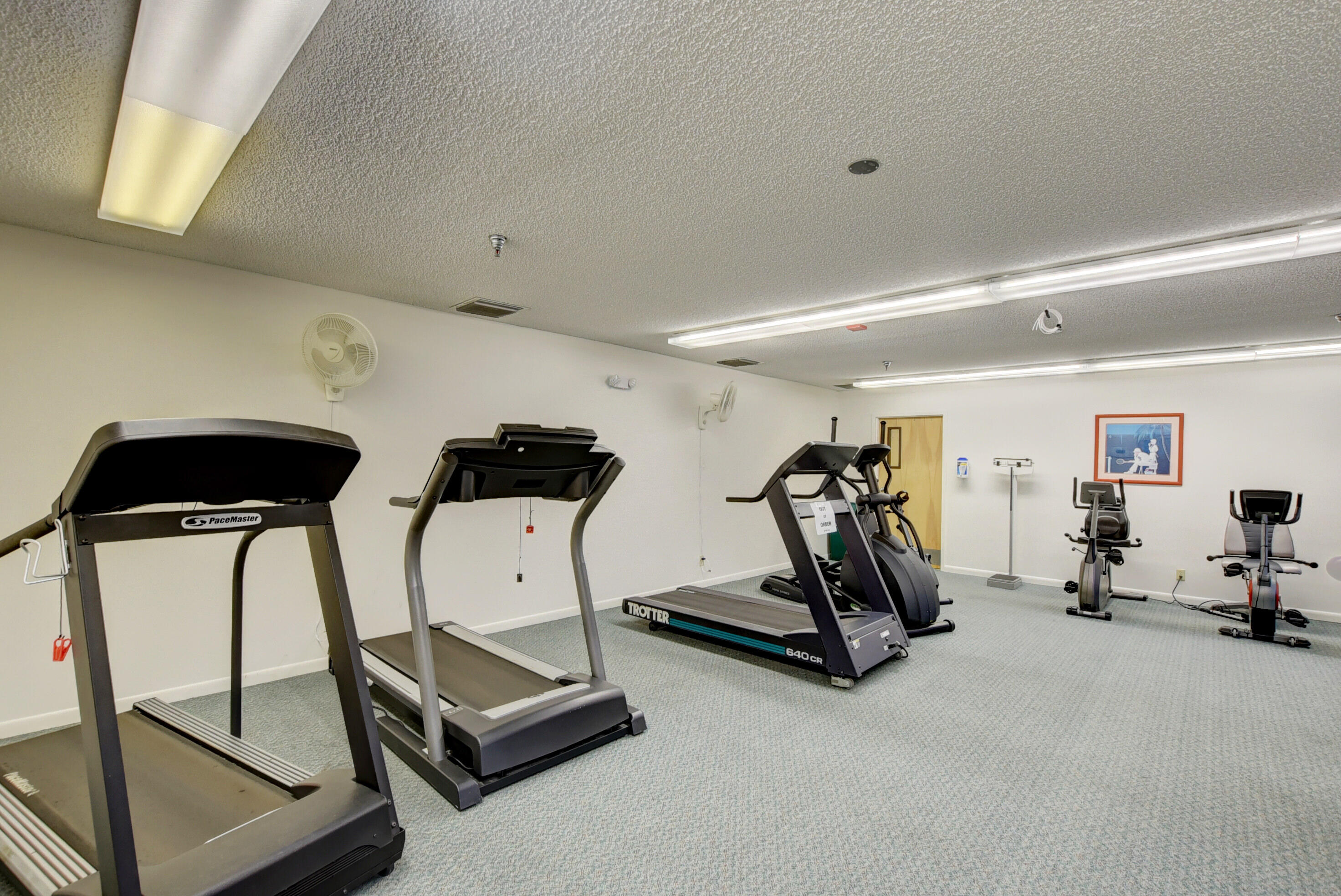 8089 Springtree Road Boca Raton, FL 33496 - Photo 37 of 44 a view of a room with gym equipment