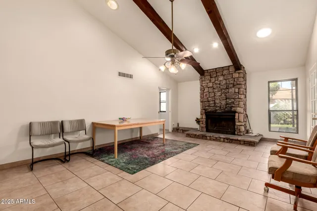 a kitchen with granite countertop stainless steel appliances and wooden cabinets