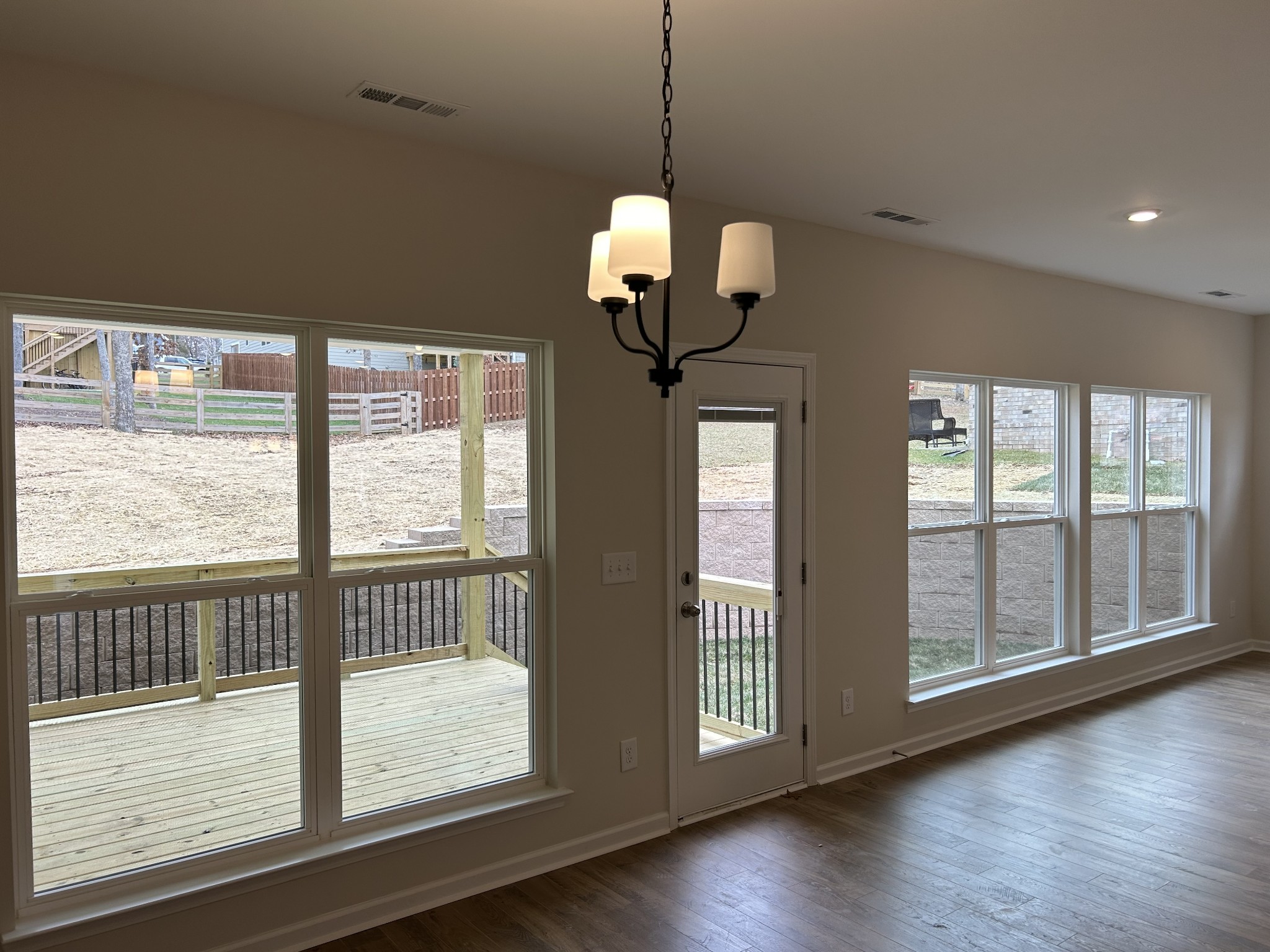 7136 Pepper Tree Circle Fairview, TN 37062 - Photo 12 of 29 a view of a room with wooden floor and balcony