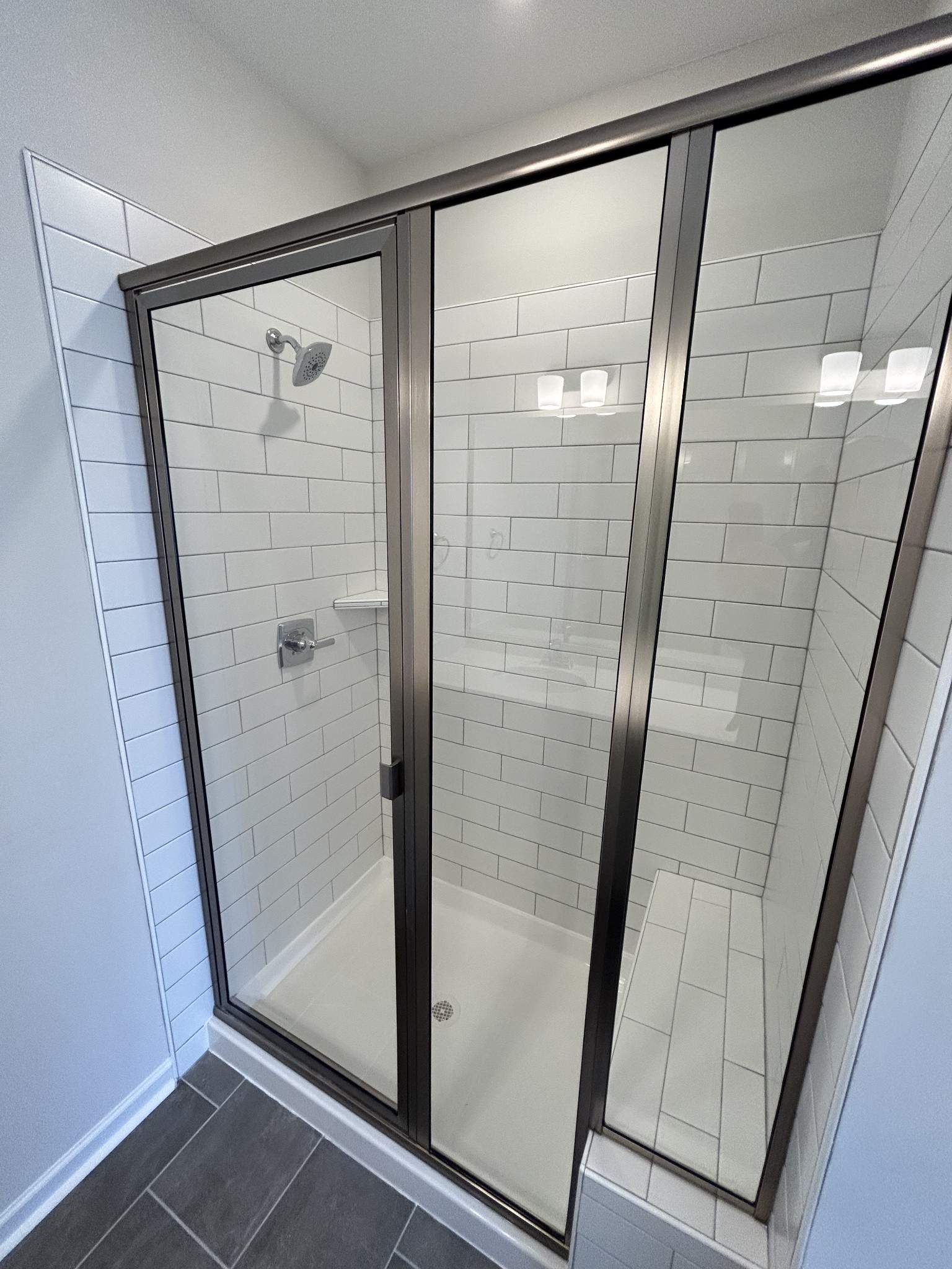 7136 Pepper Tree Circle Fairview, TN 37062 - Photo 22 of 29 a bathroom with a glass shower door