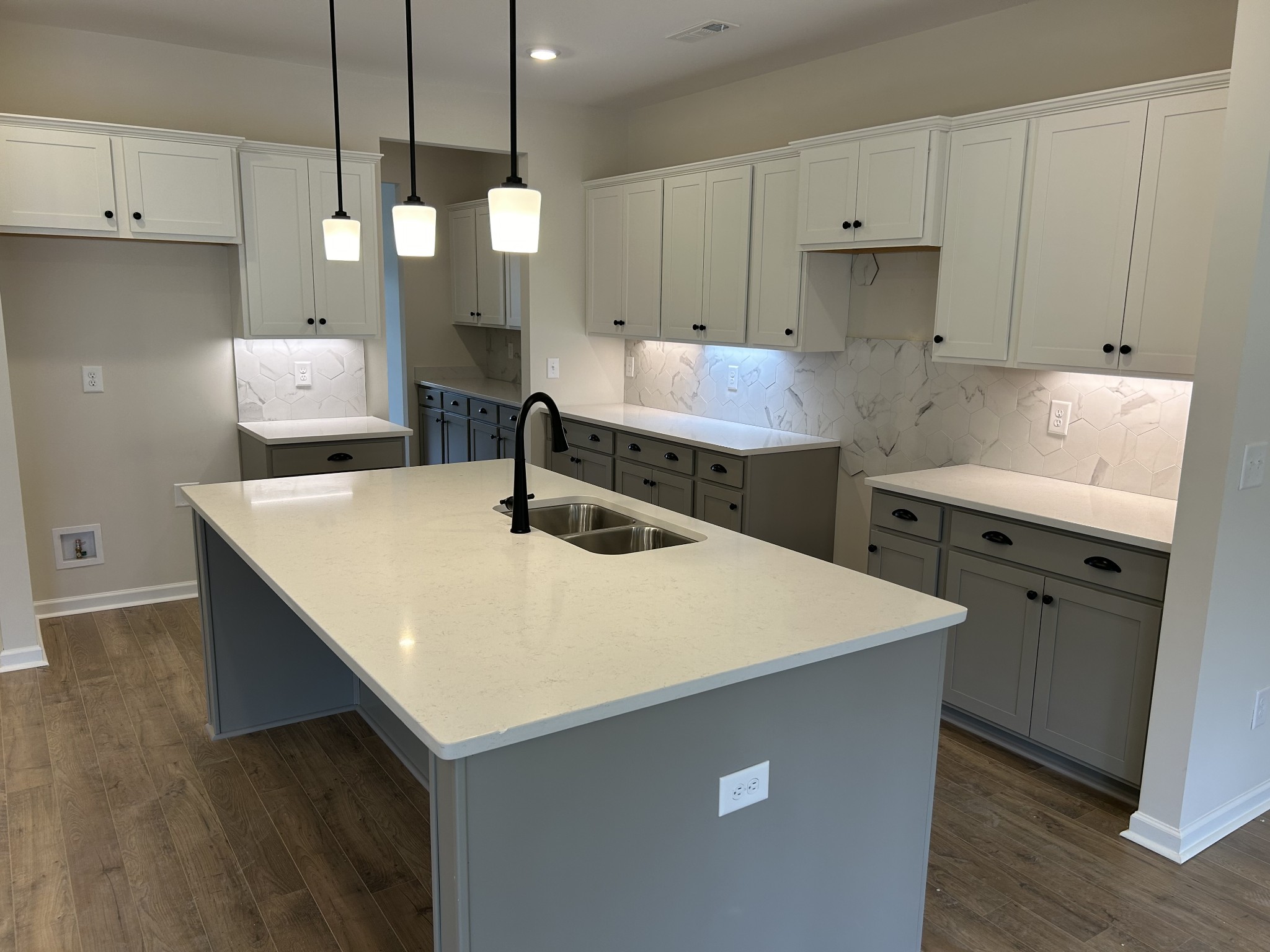 7136 Pepper Tree Circle Fairview, TN 37062 - Photo 9 of 29 a kitchen with a stove a refrigerator and a sink