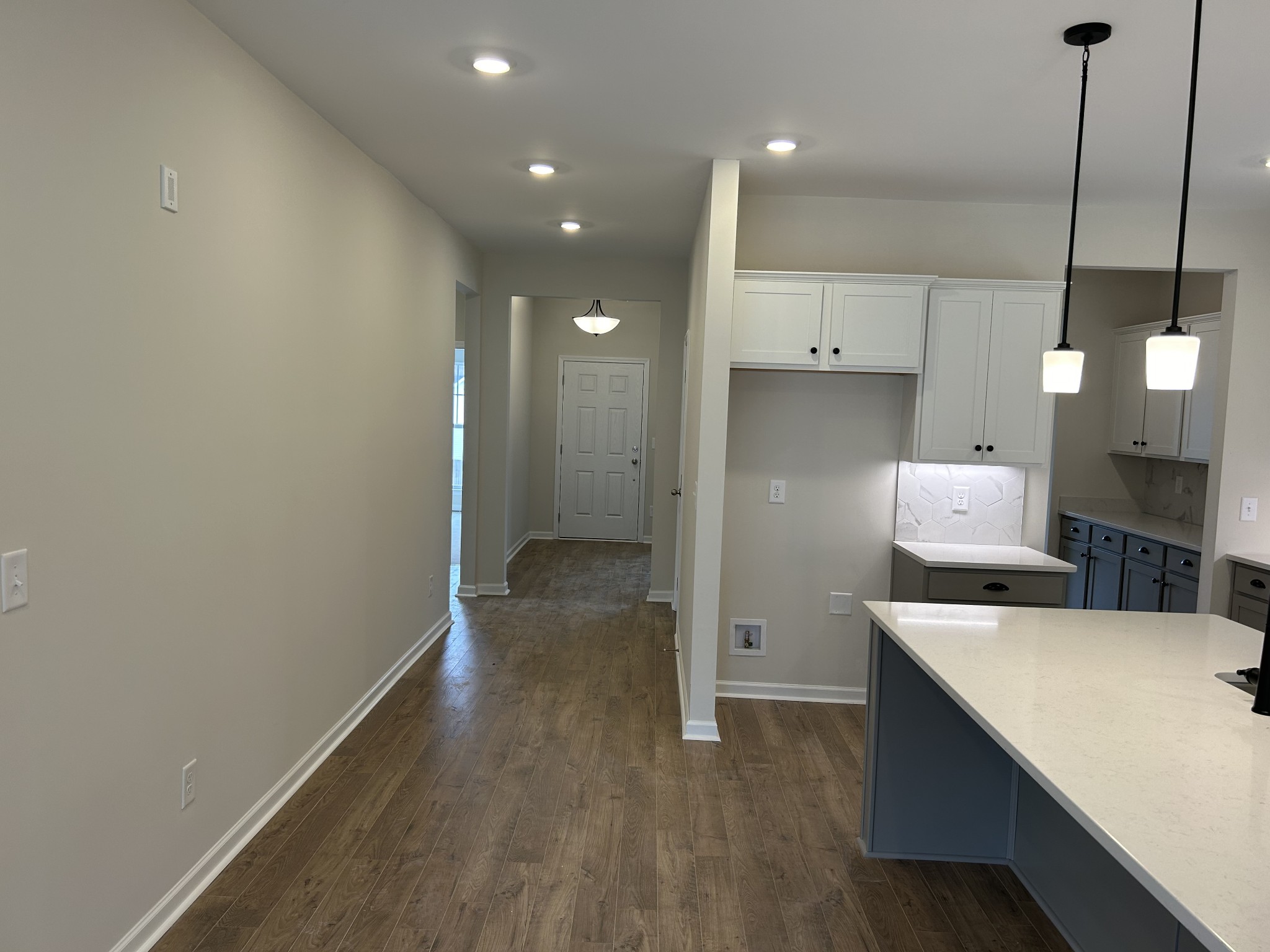 7136 Pepper Tree Circle Fairview, TN 37062 - Photo 10 of 29 a kitchen with a refrigerator and a wooden floor