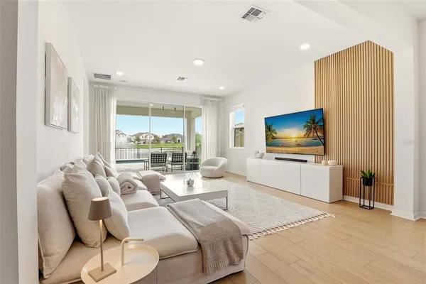 a living room with furniture and a table