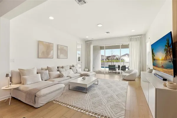 a bedroom with furniture and a couch