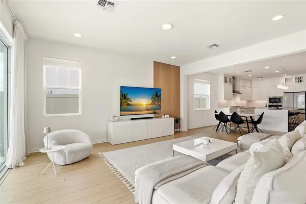 a bedroom with a bed and a couch