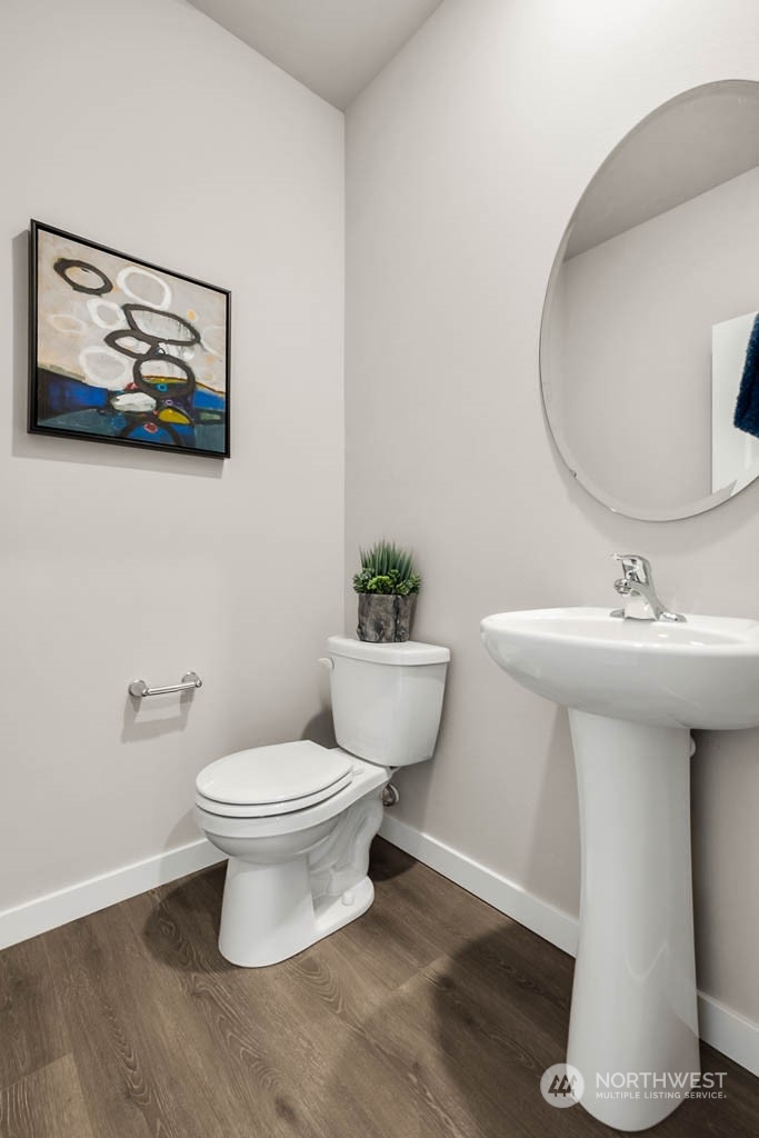 2902 Longhorn Loop, Unit 246 Ellensburg, WA 98926 - Photo 6 of 30 a bathroom with a toilet sink and mirror