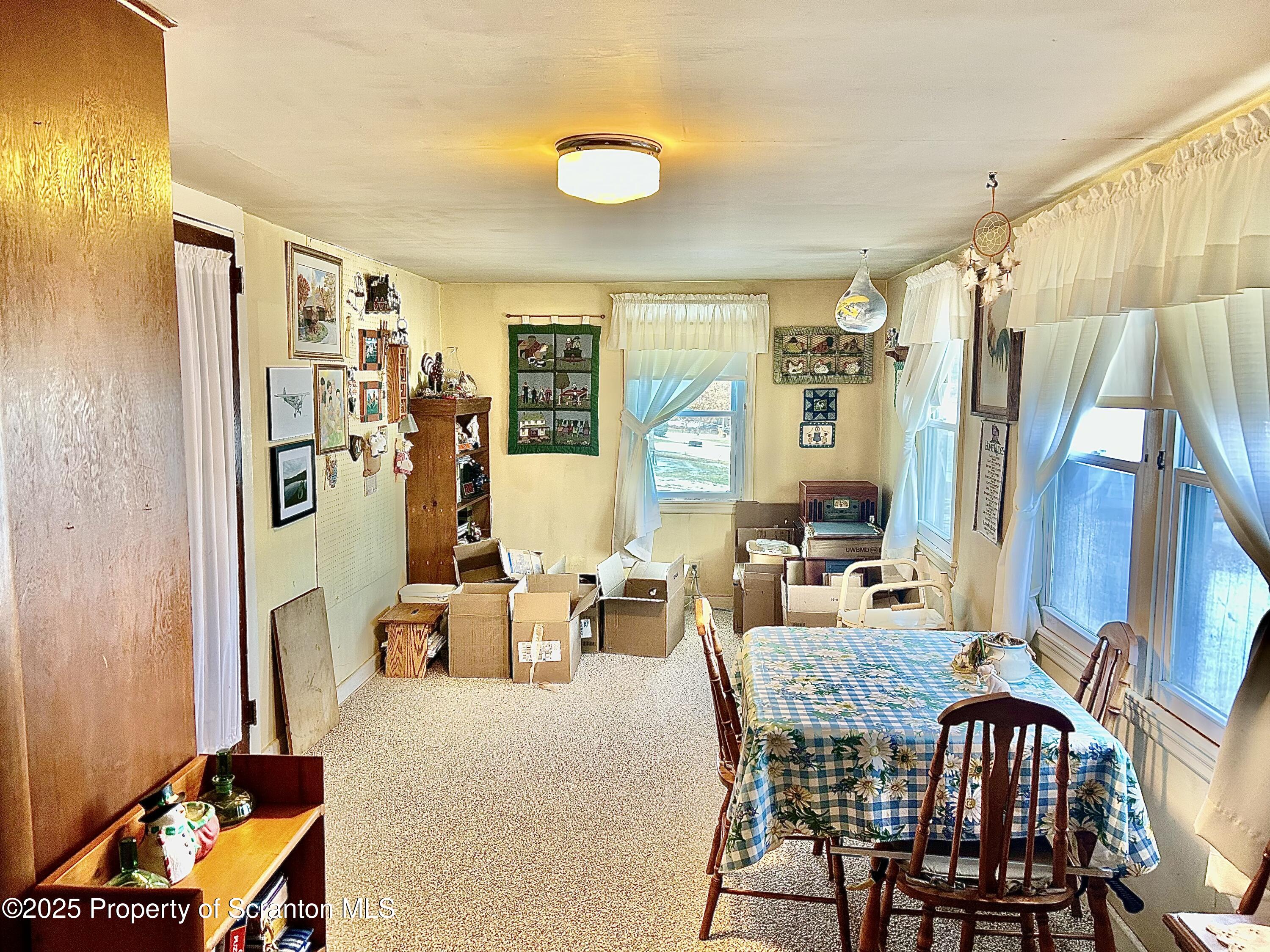 166 State Rte 2005 Springville, PA 18844 - Photo 11 of 44 a dining room with furniture and window