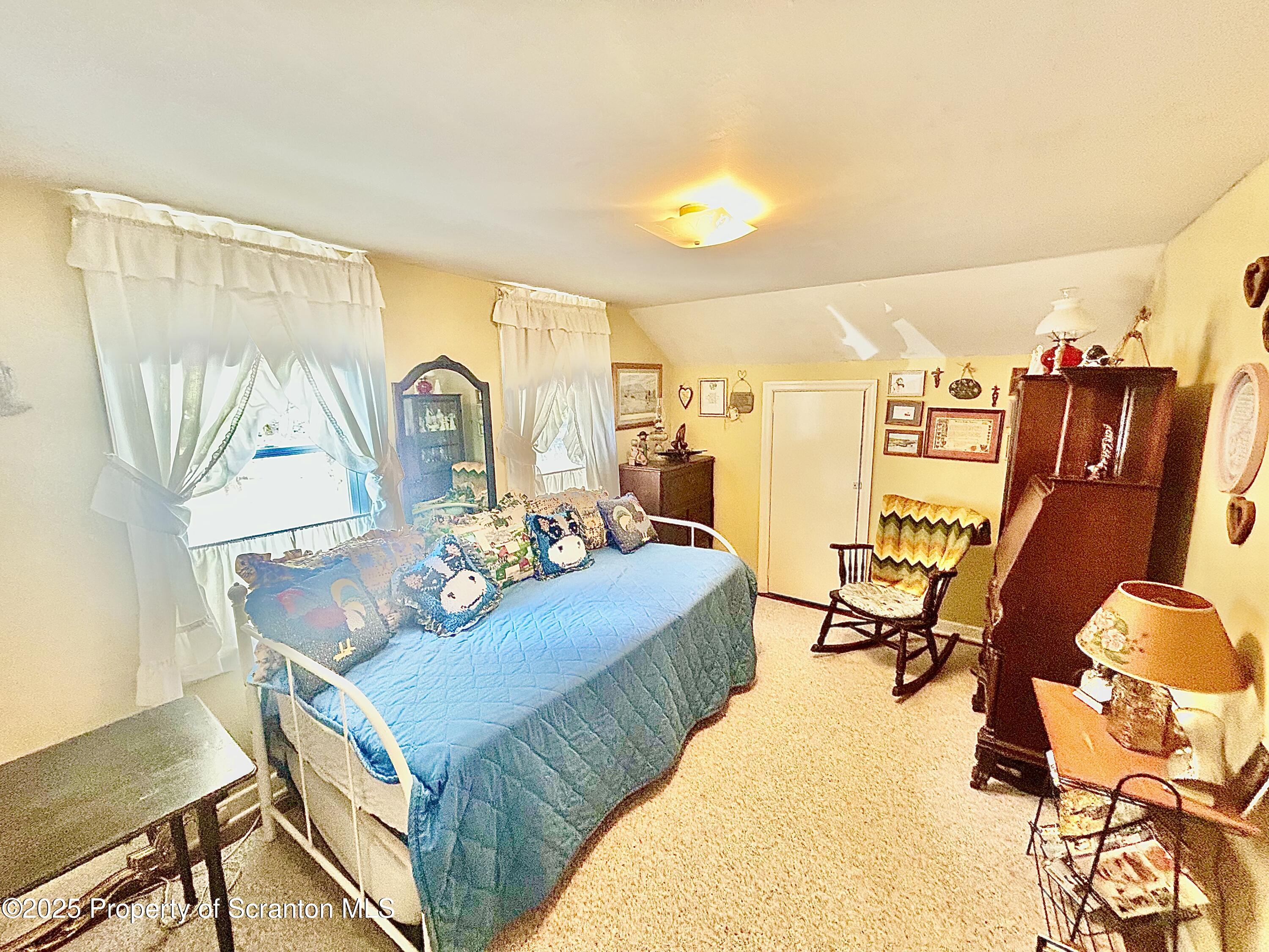 166 State Rte 2005 Springville, PA 18844 - Photo 18 of 44 a living room with furniture and a table