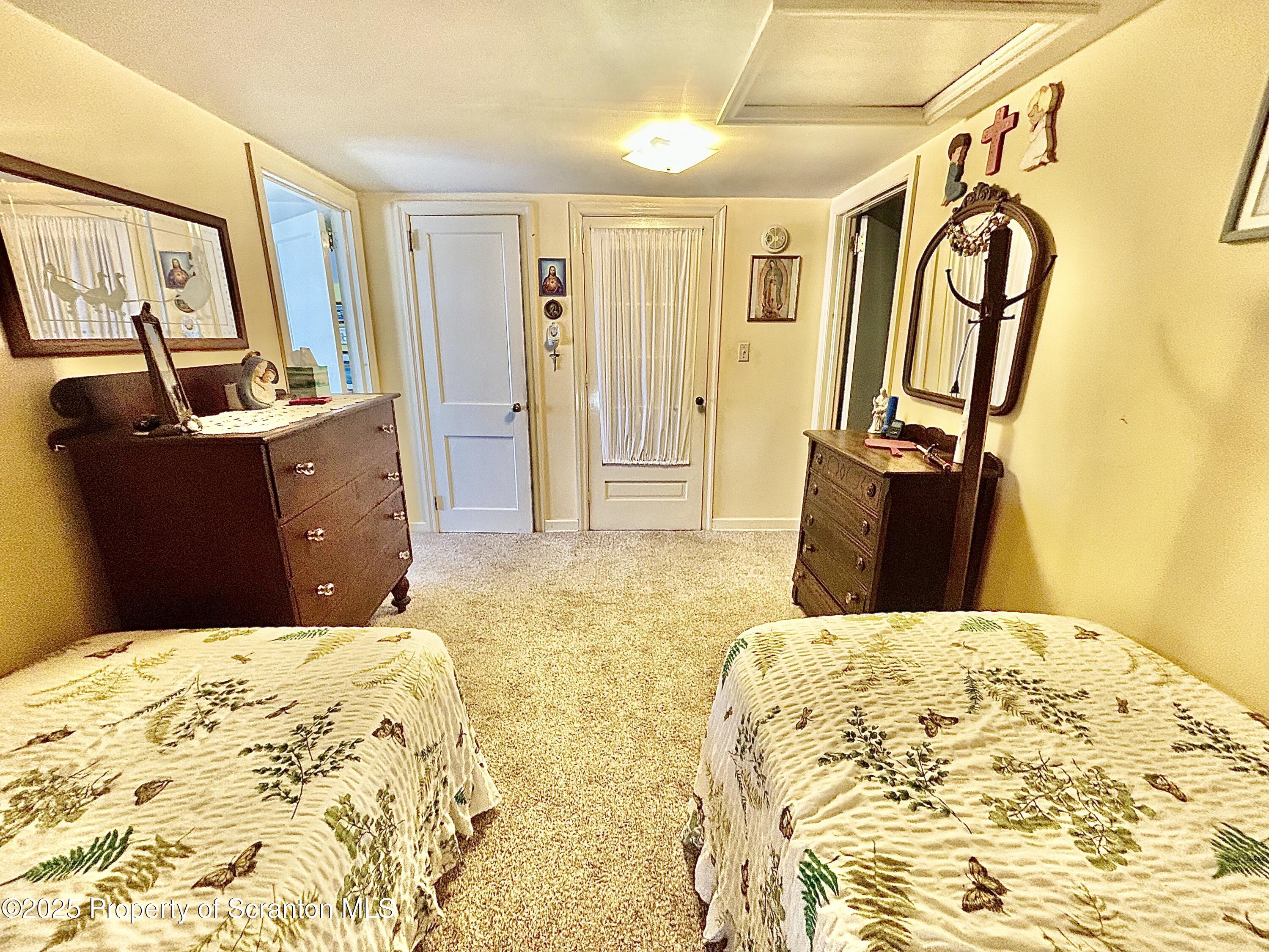 166 State Rte 2005 Springville, PA 18844 - Photo 20 of 44 a bedroom with a bed and wooden floor