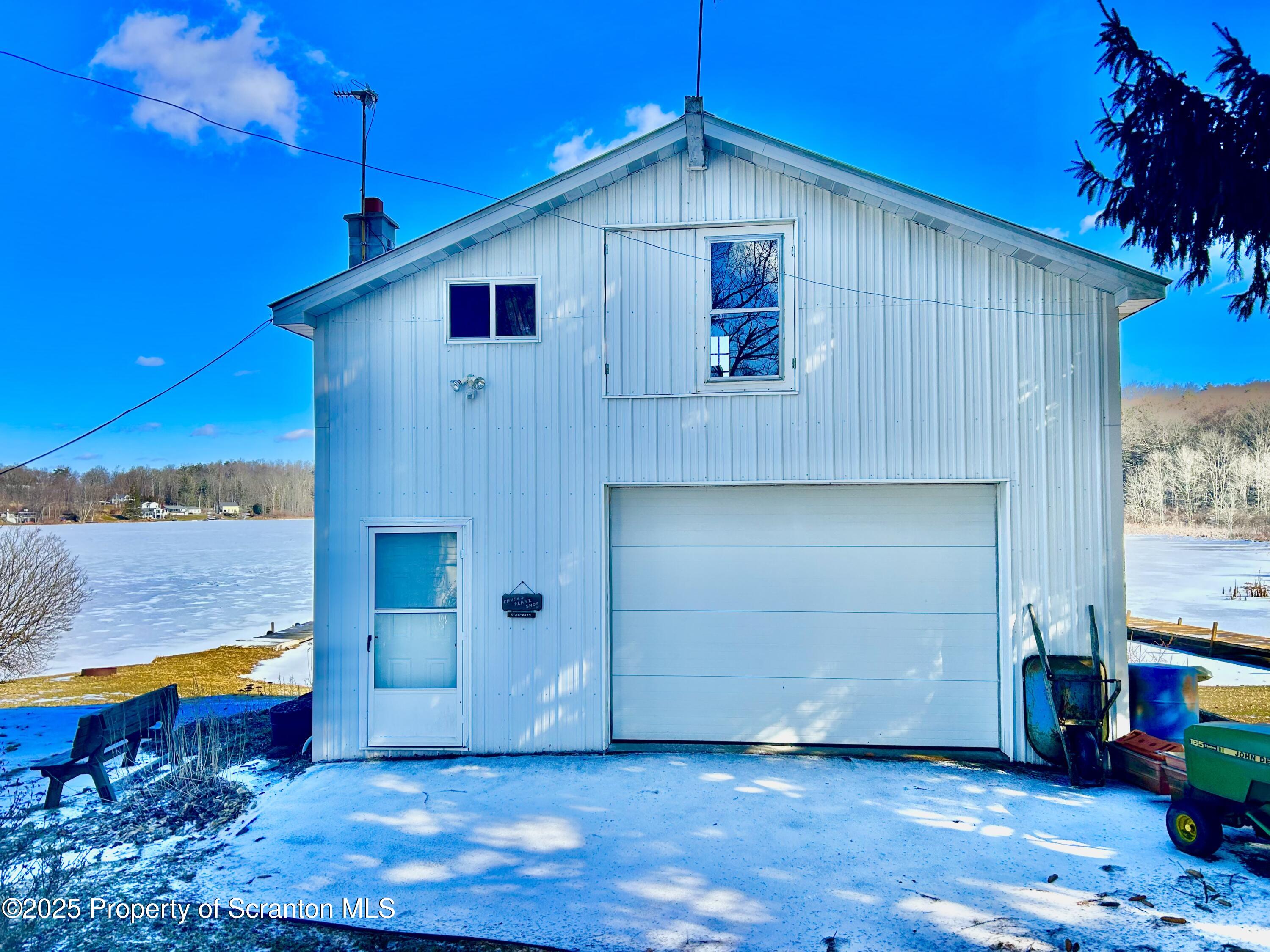 166 State Rte 2005 Springville, PA 18844 - Photo 26 of 44 an entrance to house with yard and wooden fence