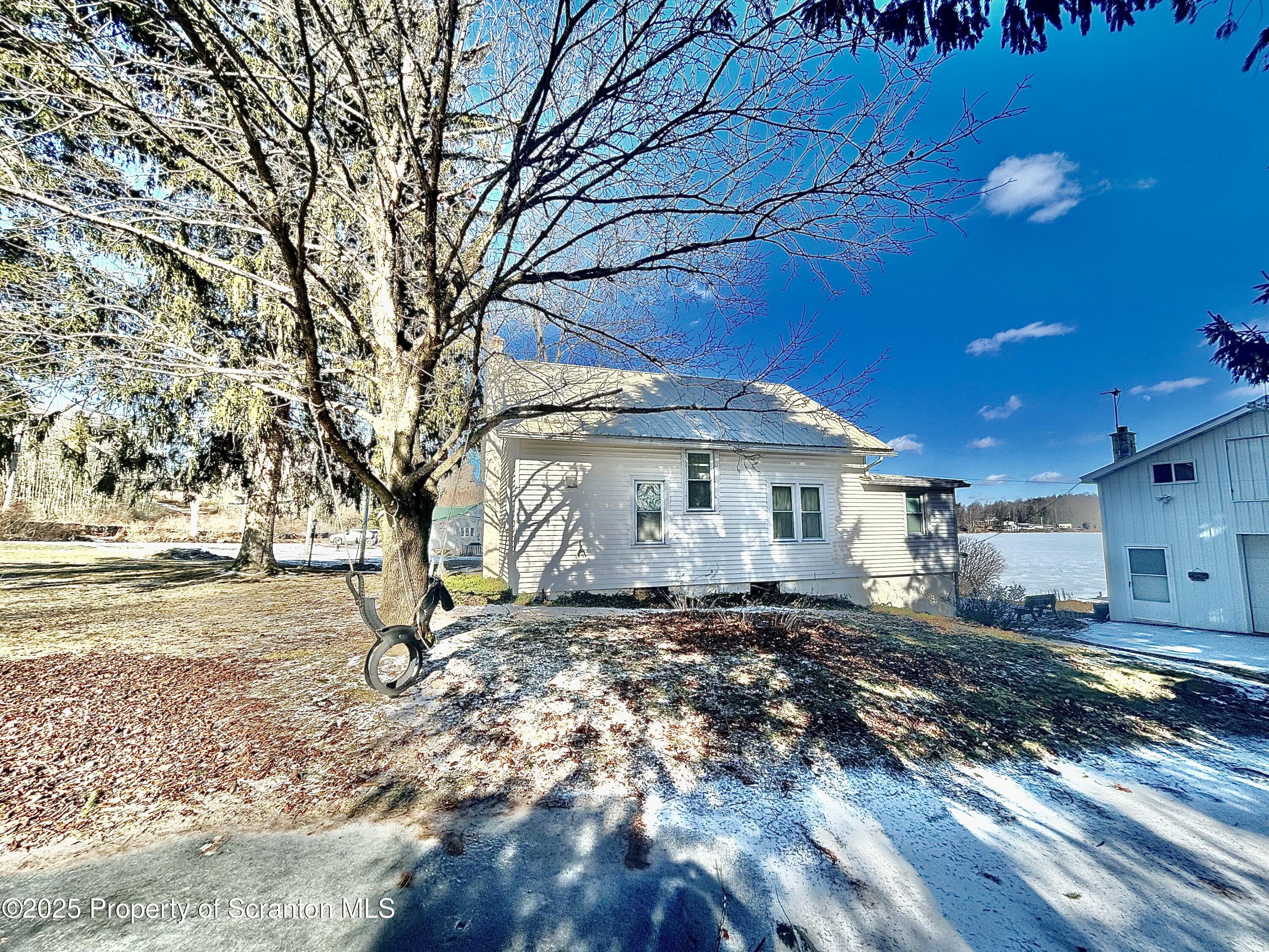 166 State Rte 2005 Springville, PA 18844 - Photo 32 of 44 a view of a house with a yard