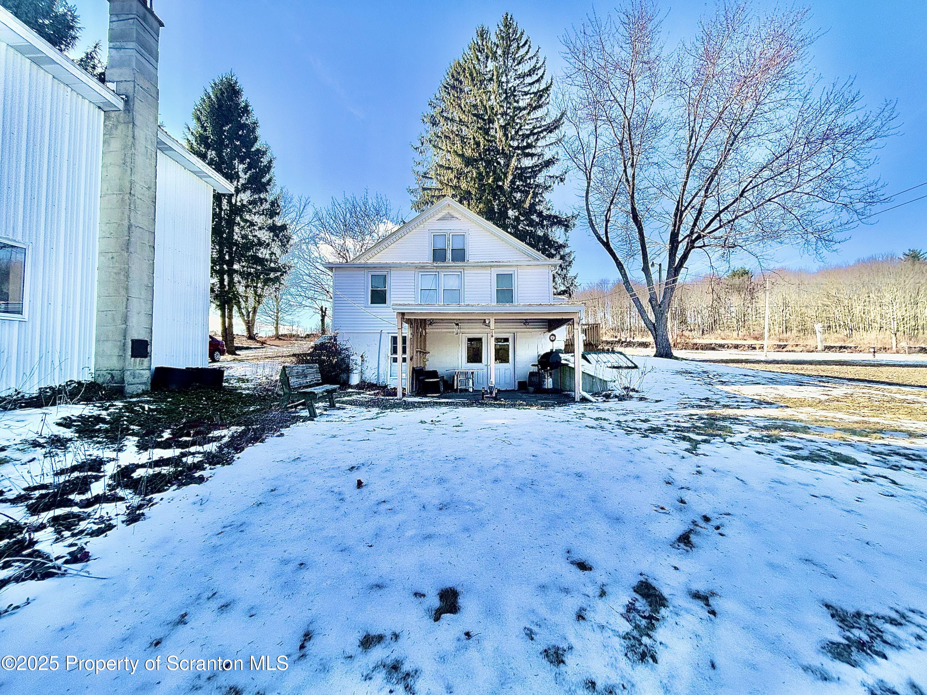 166 State Rte 2005 Springville, PA 18844 - Photo 33 of 44 a front view of a house with a yard