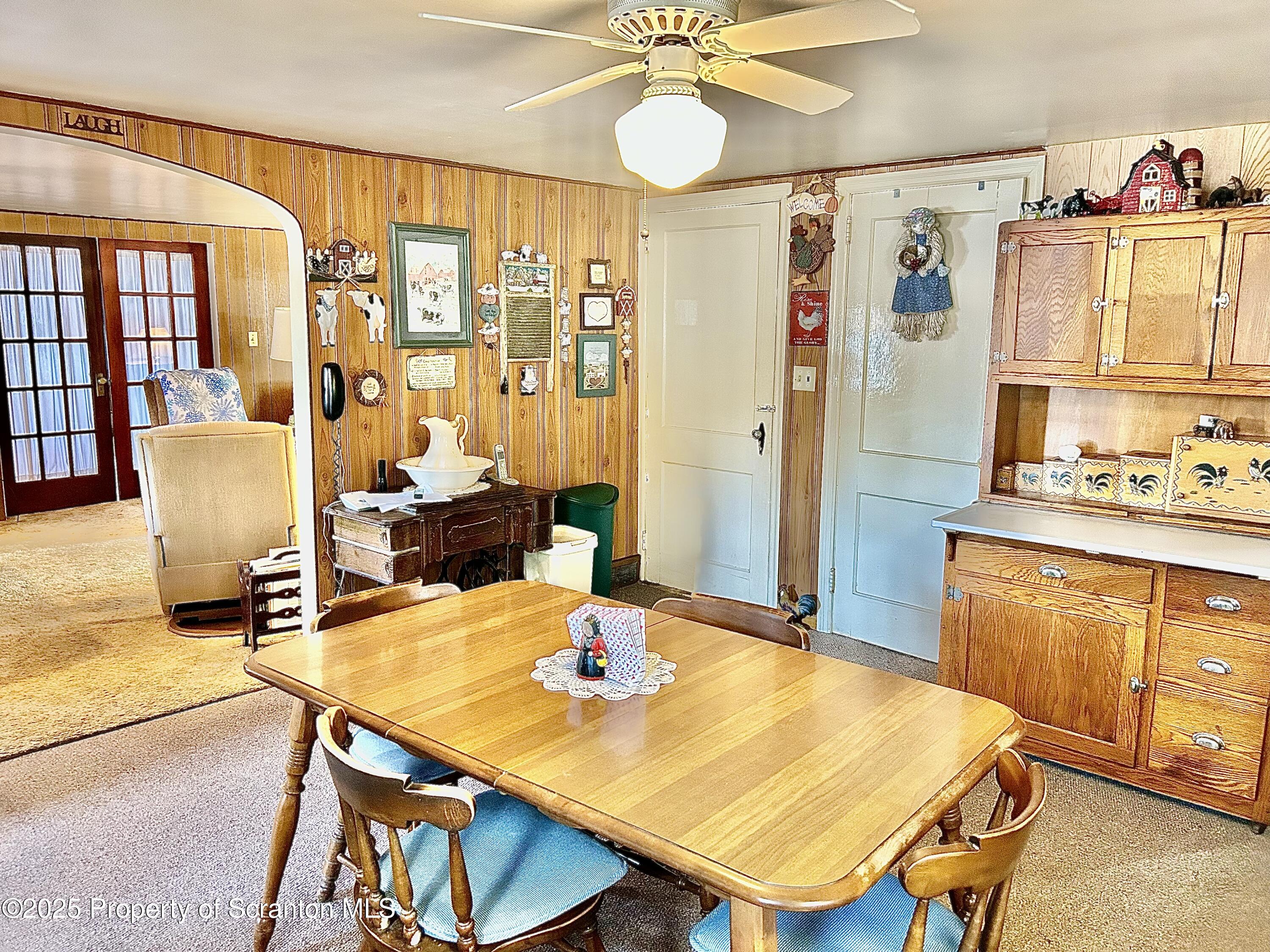 166 State Rte 2005 Springville, PA 18844 - Photo 4 of 44 a view of a dining room with furniture and a chandelier