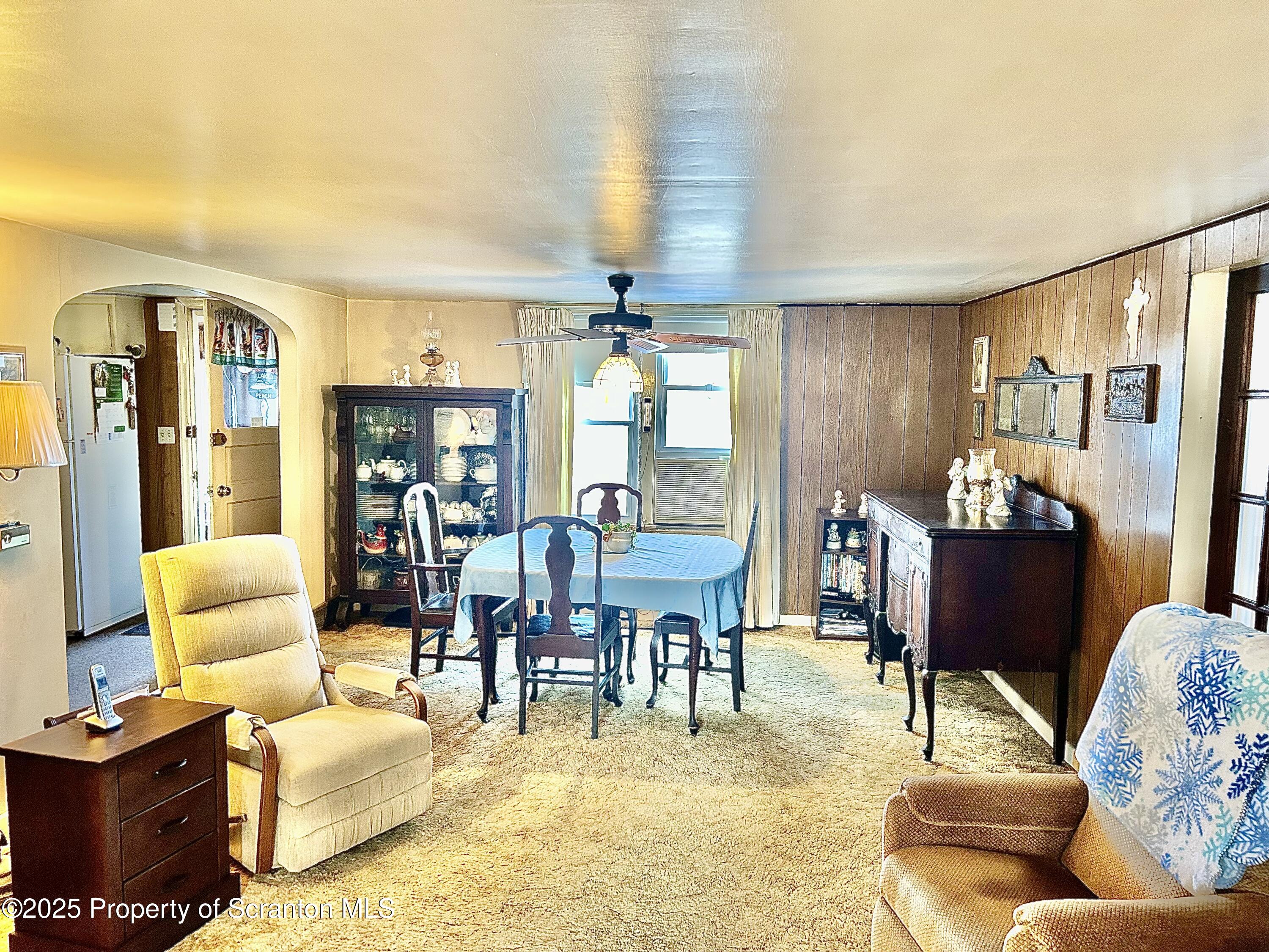166 State Rte 2005 Springville, PA 18844 - Photo 7 of 44 a living room with furniture dining area and a lamp