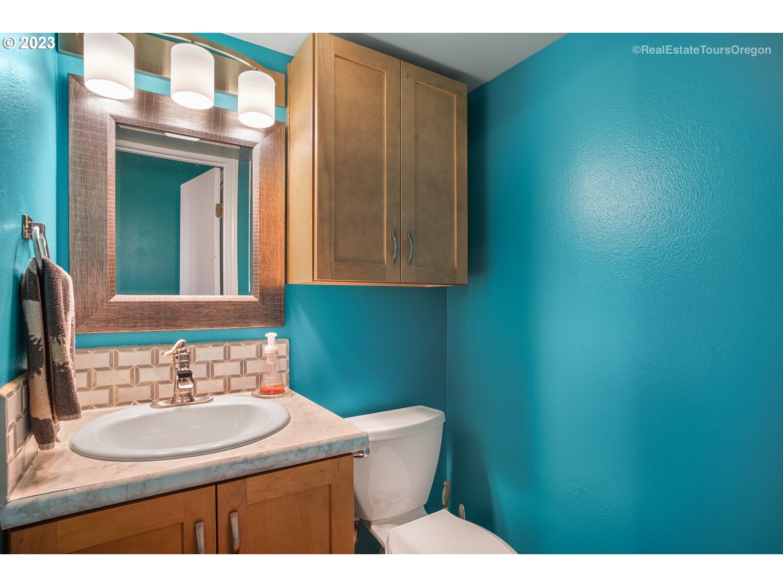 7325 Southwest 158th Place Beaverton, OR 97007 - Photo 13 of 28 a bathroom with a sink and a mirror