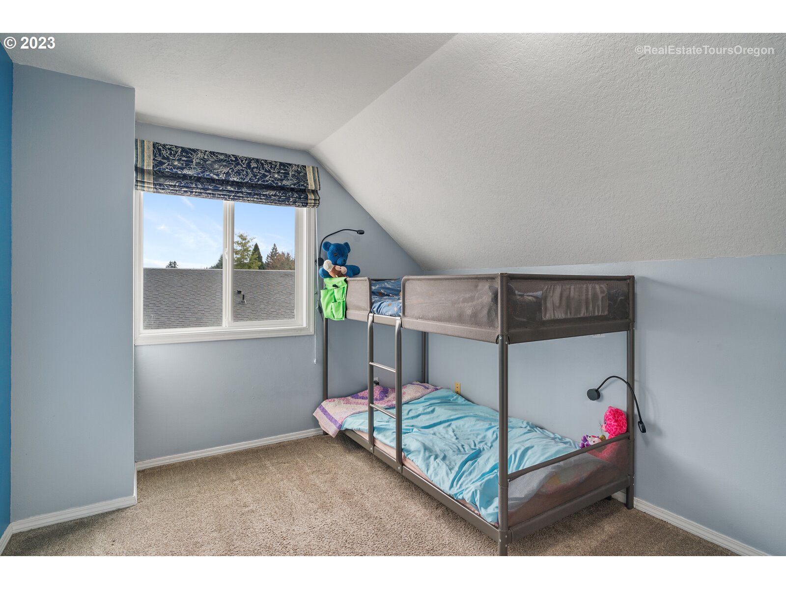 7325 Southwest 158th Place Beaverton, OR 97007 - Photo 18 of 28 a bedroom with furniture and a window