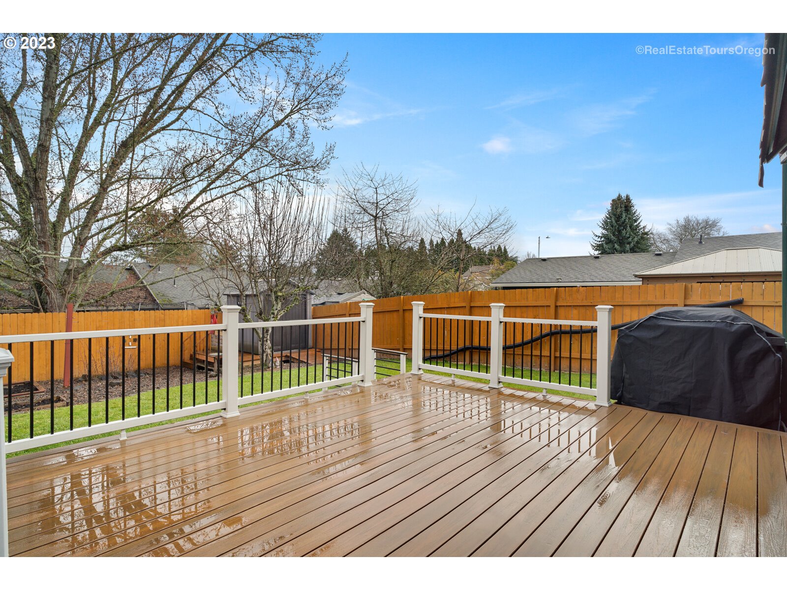 7325 Southwest 158th Place Beaverton, OR 97007 - Photo 23 of 28 a view of balcony with wooden floor and fence