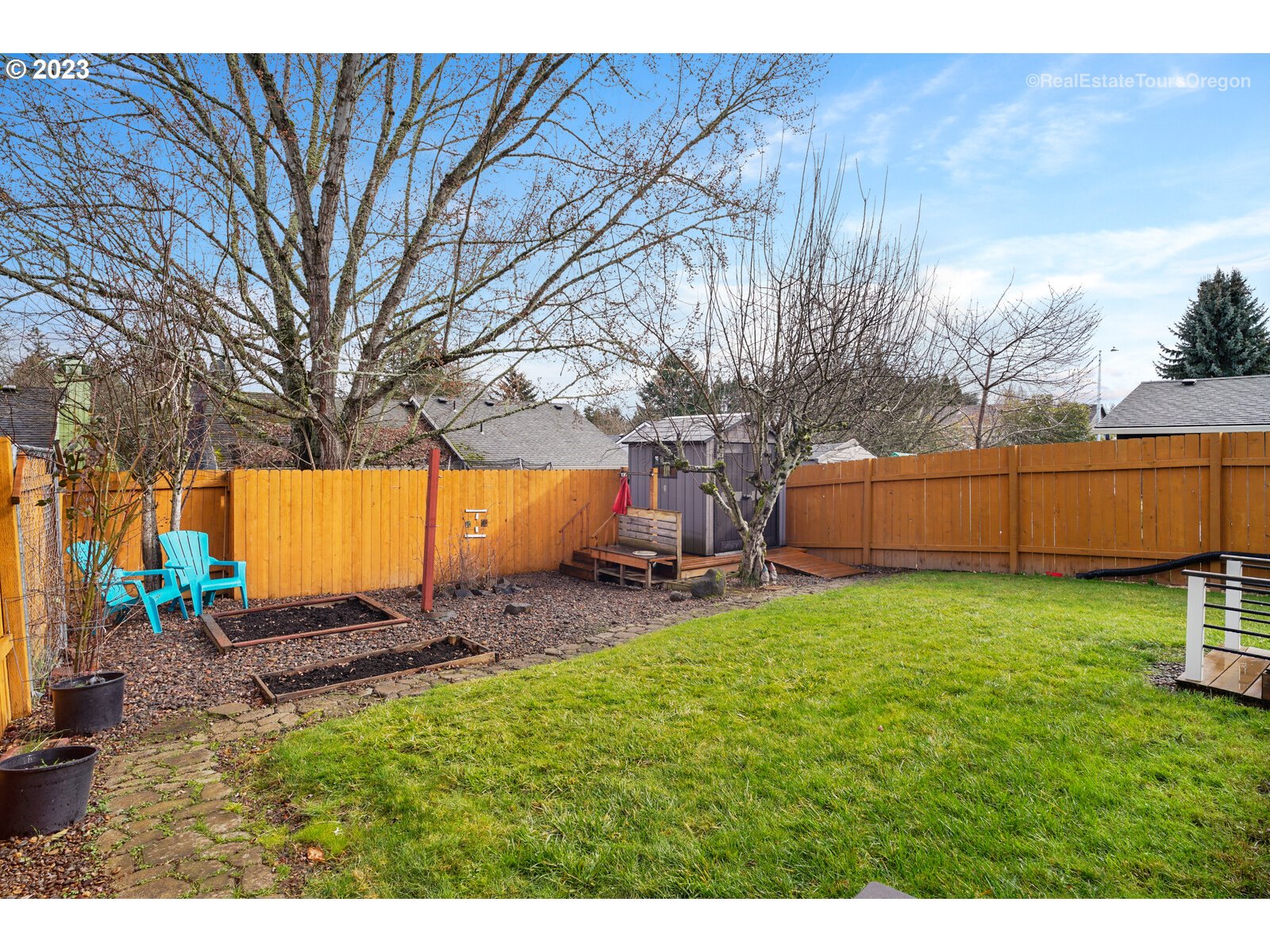 7325 Southwest 158th Place Beaverton, OR 97007 - Photo 25 of 28 a backyard of a house with lots of green space