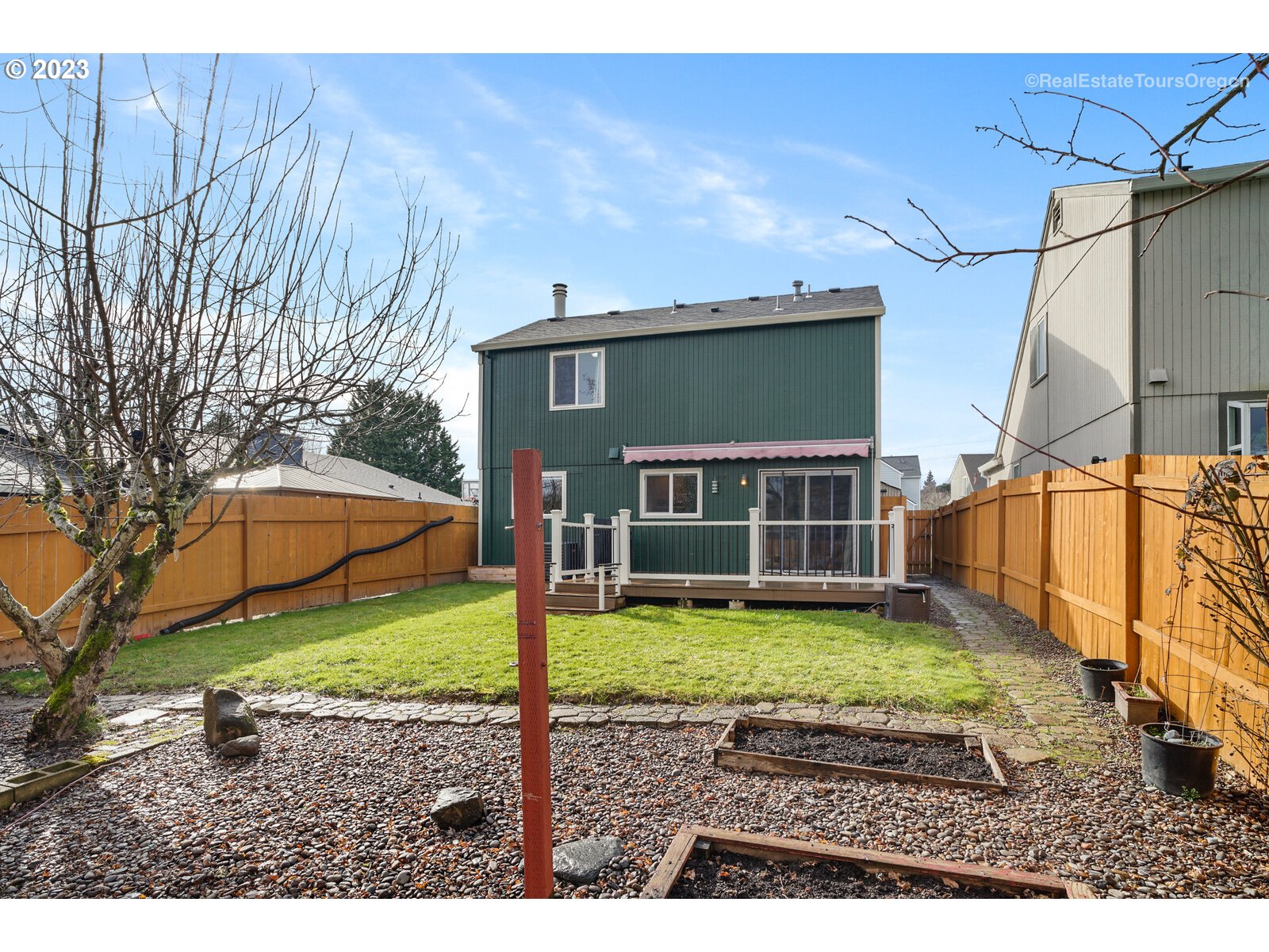 7325 Southwest 158th Place Beaverton, OR 97007 - Photo 26 of 28 a view of a house with a yard