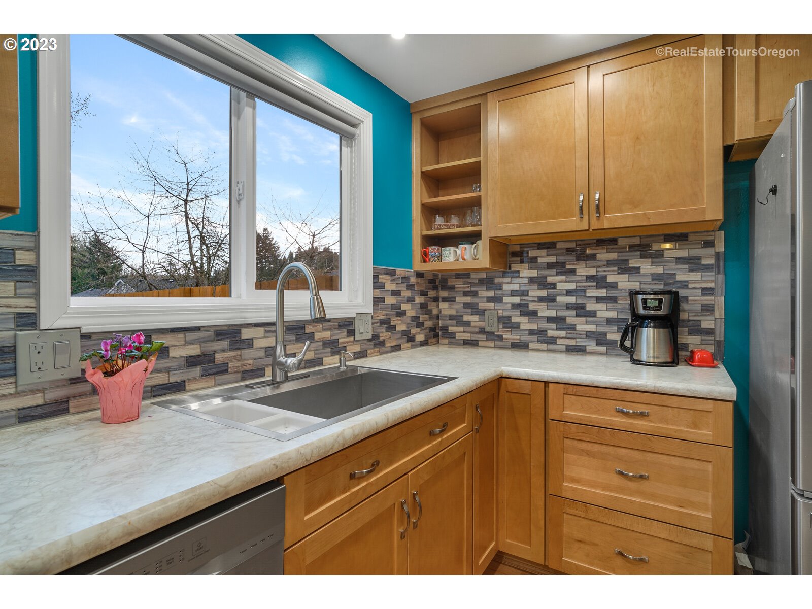 7325 Southwest 158th Place Beaverton, OR 97007 - Photo 8 of 28 a kitchen with a sink and large window