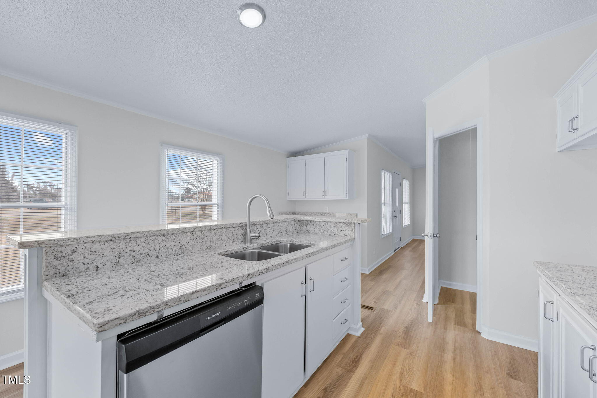 927 Stanley Chapel Church Road Mount Olive, NC 28365 - Photo 12 of 34 a kitchen with a sink stove and cabinets
