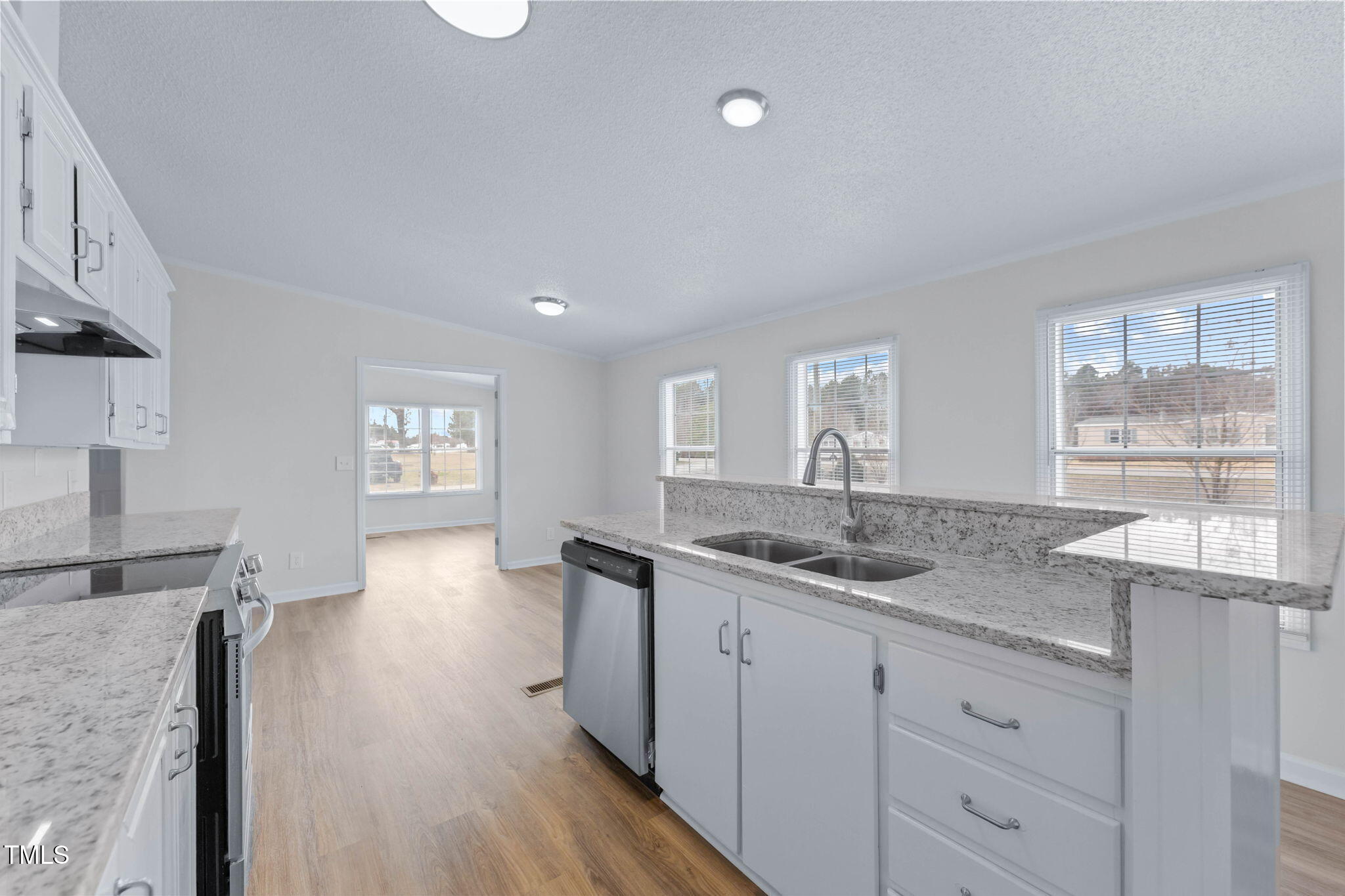 927 Stanley Chapel Church Road Mount Olive, NC 28365 - Photo 13 of 34 a hallway with sink and mirror