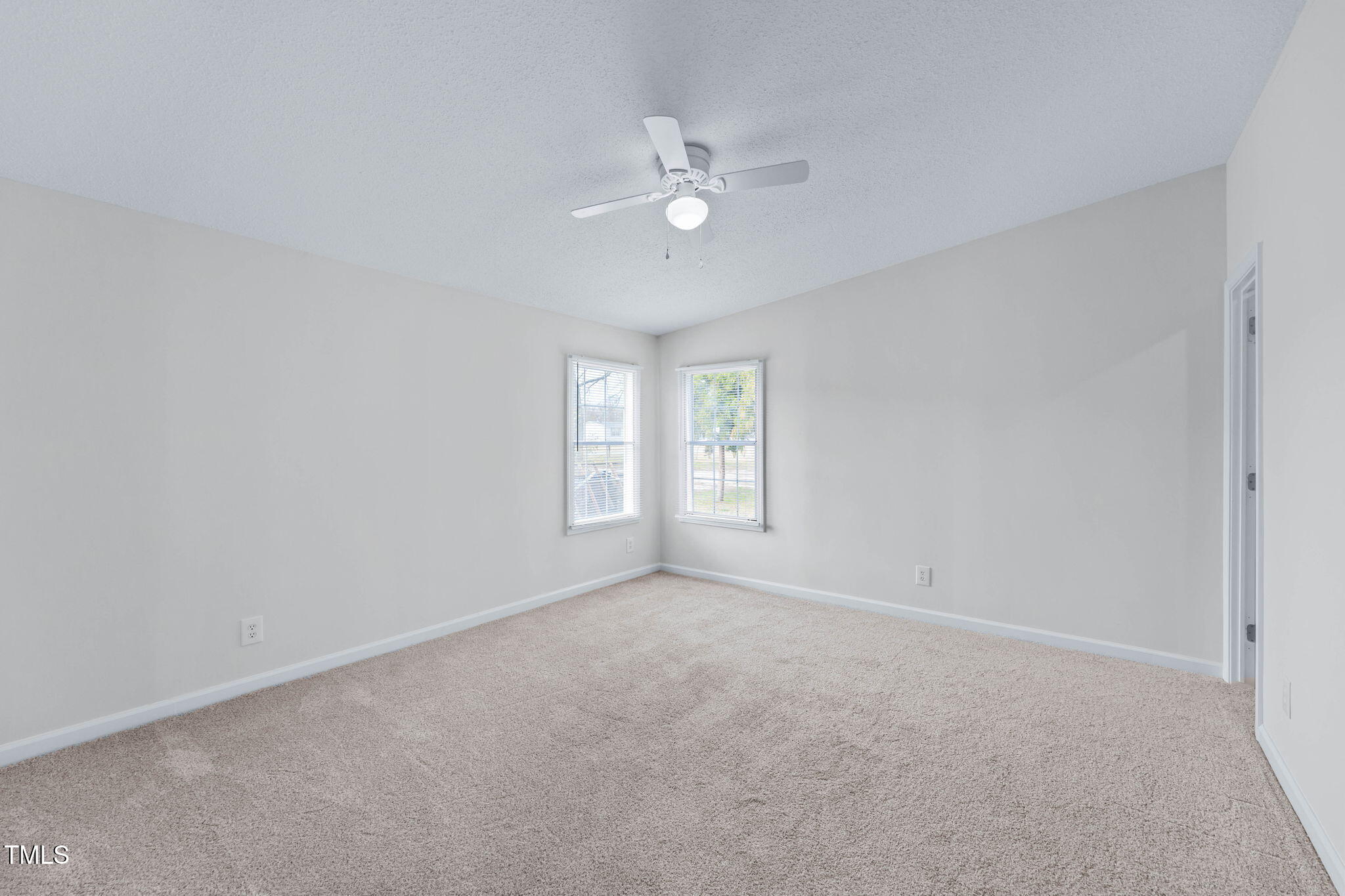 927 Stanley Chapel Church Road Mount Olive, NC 28365 - Photo 25 of 34 a view of a livingroom with a ceiling fan and window