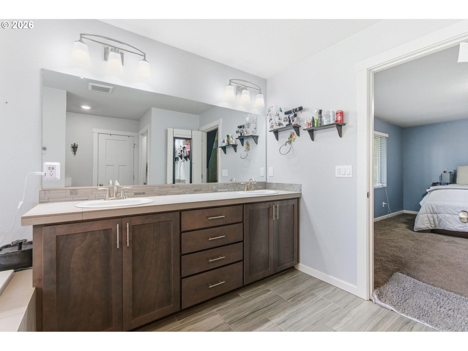 476 Southwest 15th Avenue Canby, OR 97013 - Photo 31 of 41 a bathroom with a sink vanity and a mirror