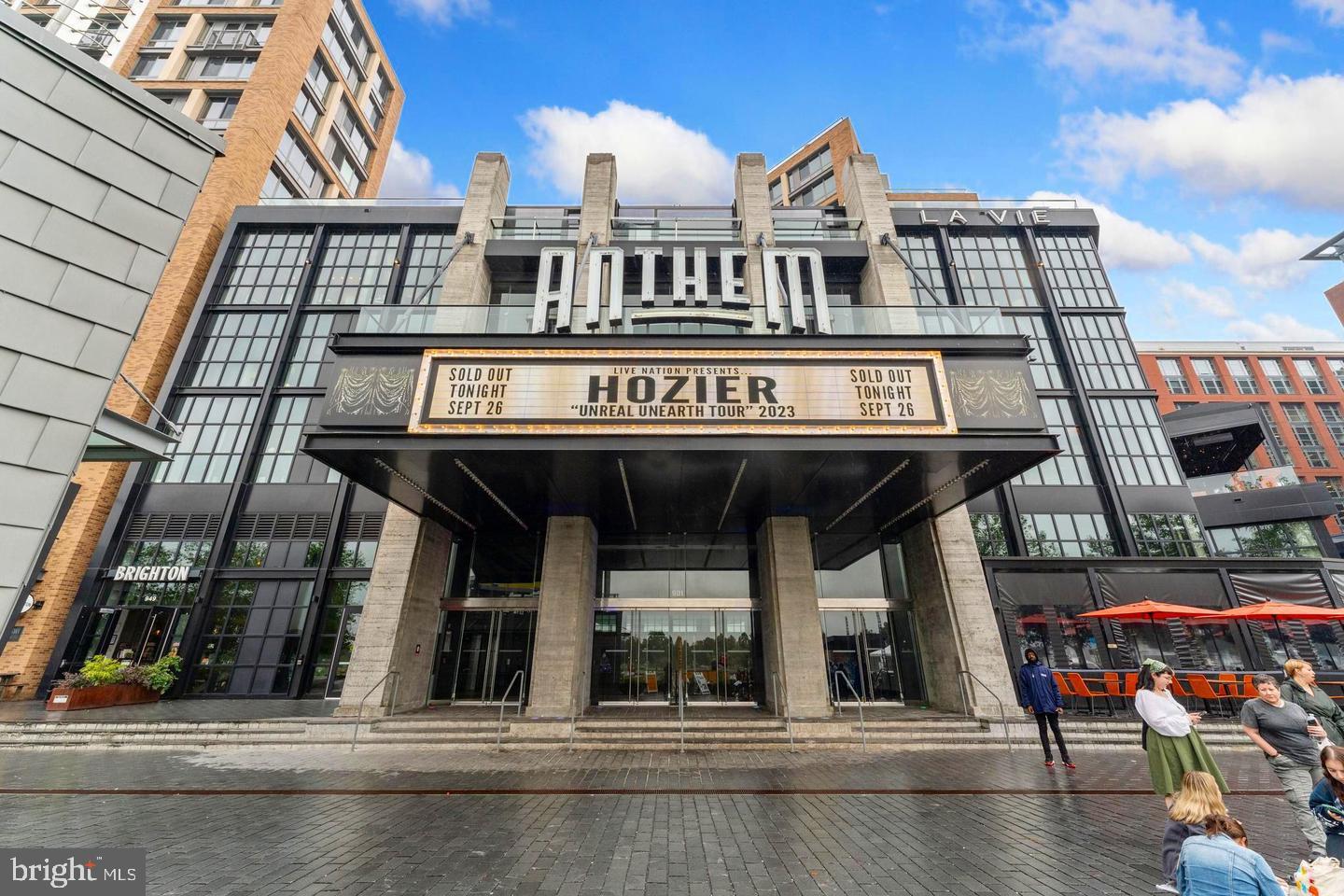 1425 4th Street Southwest, Unit A502 Washington, DC 20024 - Photo 42 of 51 a front view of a building with retail shops