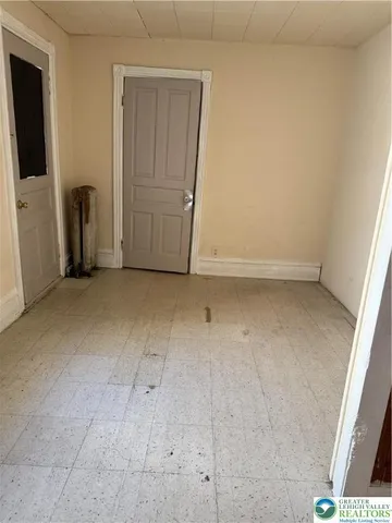 a bathroom with a tub a sink and a shower