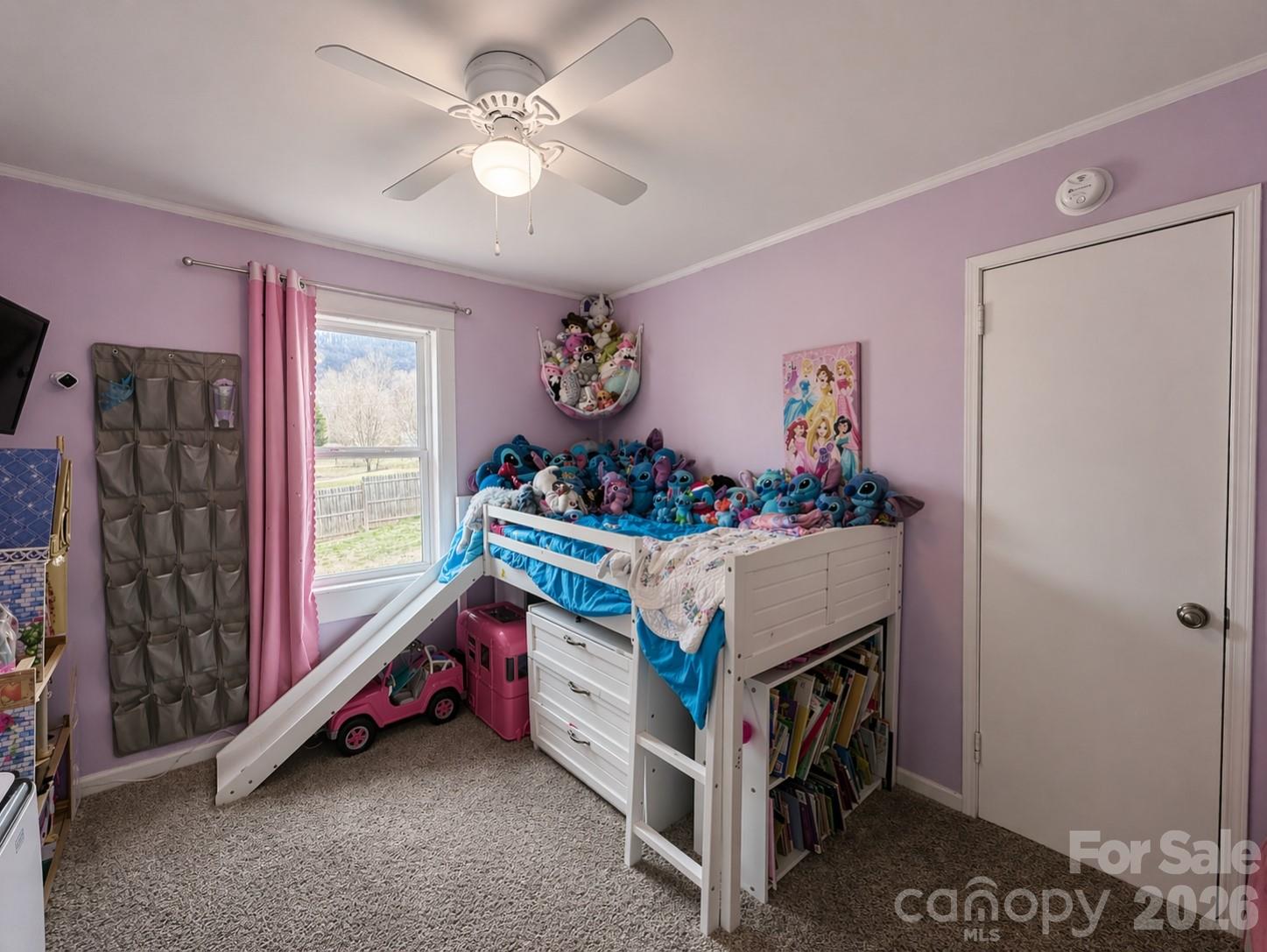 104 Old Fort Road Fairview, NC 28730 - Photo 12 of 17 a bed room with a bed and a window