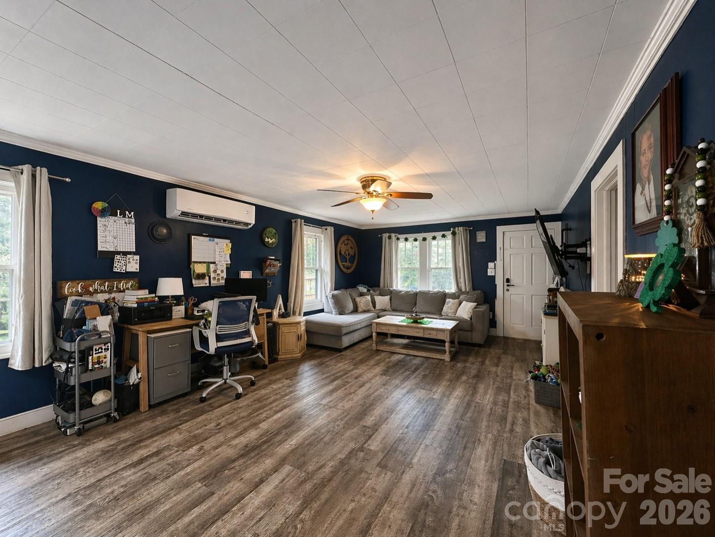 104 Old Fort Road Fairview, NC 28730 - Photo 6 of 17 a living room with furniture and a wooden floor
