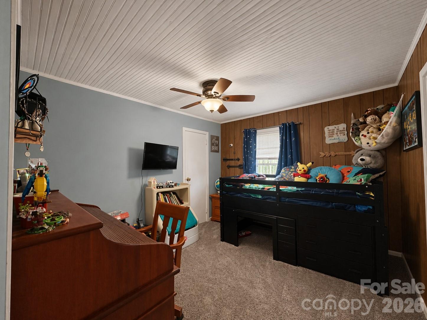 104 Old Fort Road Fairview, NC 28730 - Photo 9 of 17 a living room with furniture and a flat screen tv