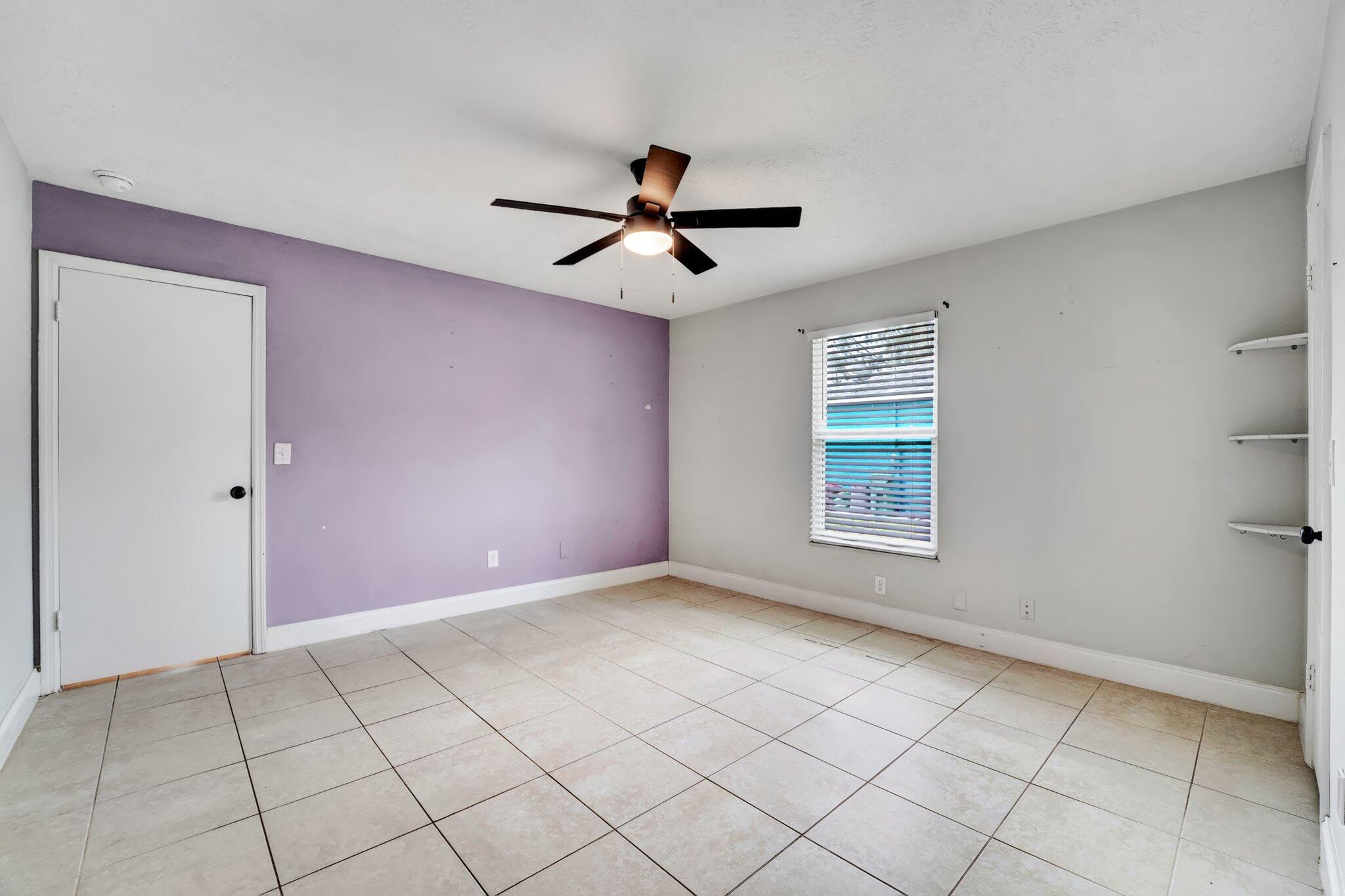 1918 Southeast Cheltenham Street Port St. Lucie, FL 34983 - Photo 10 of 15 Master bedroom