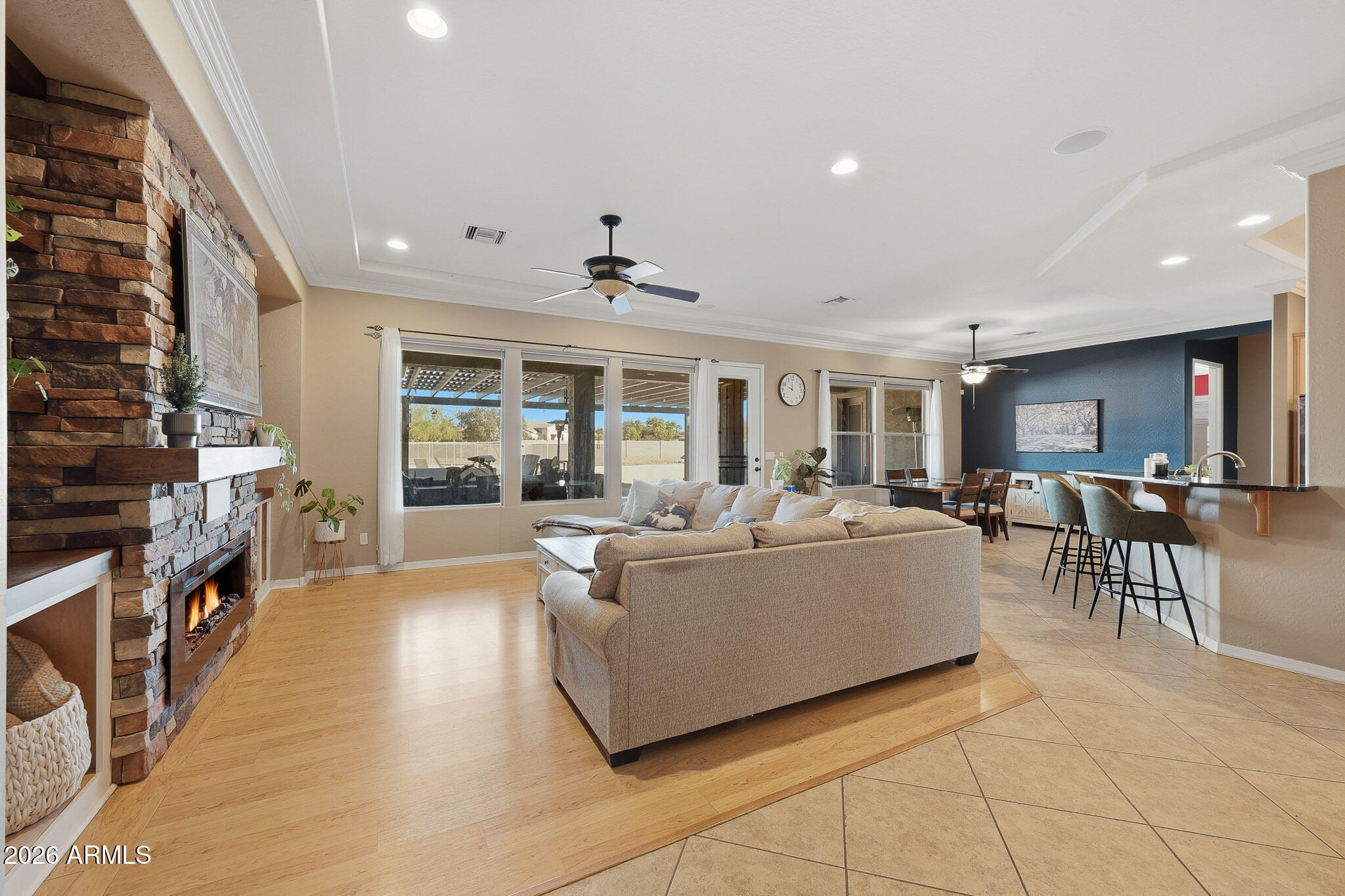 23024 West Sierra Ridge Way Wittmann, AZ 85361 - Photo 23 of 99 a living room with furniture and a table