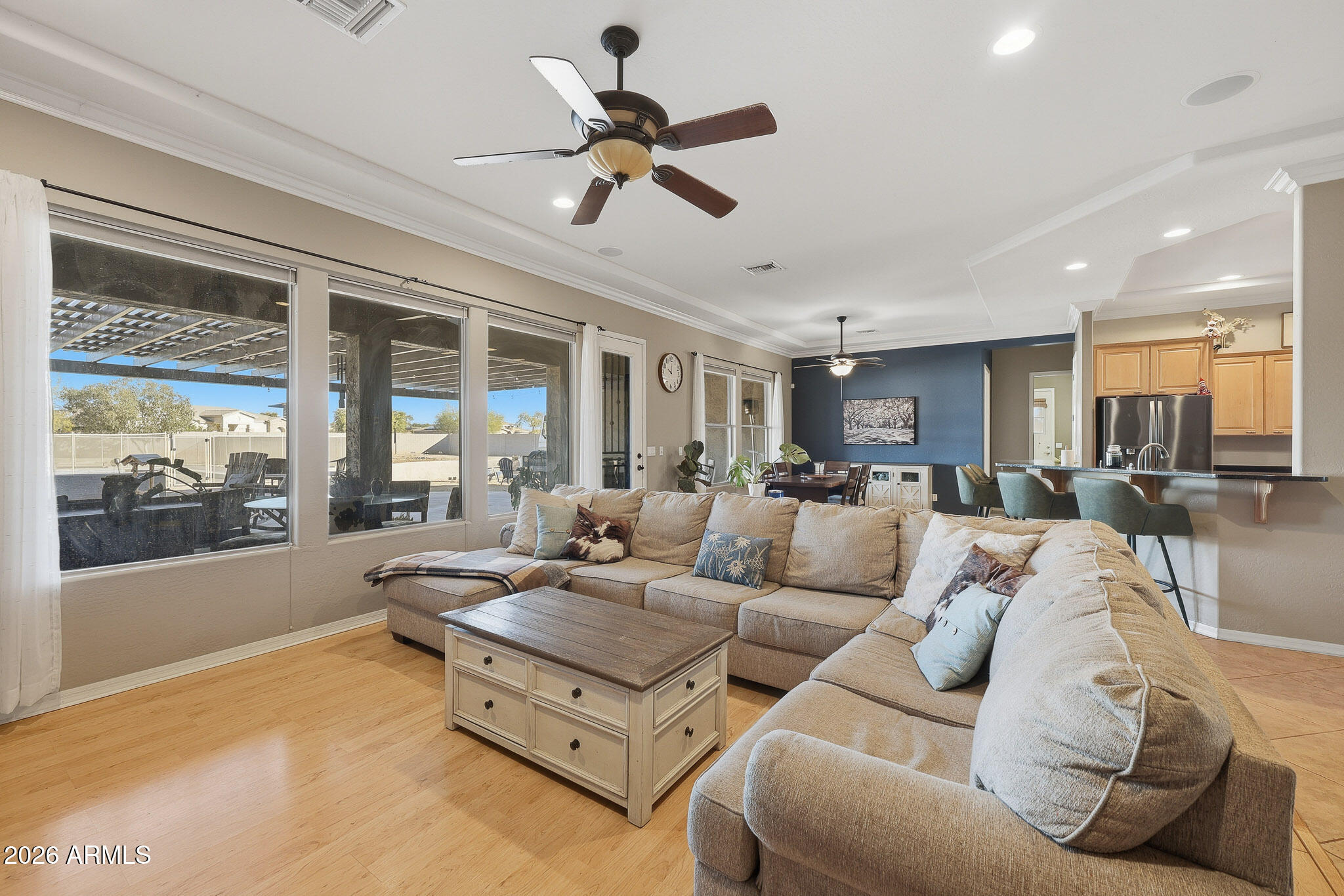 23024 West Sierra Ridge Way Wittmann, AZ 85361 - Photo 24 of 99 a living room with furniture and a large window