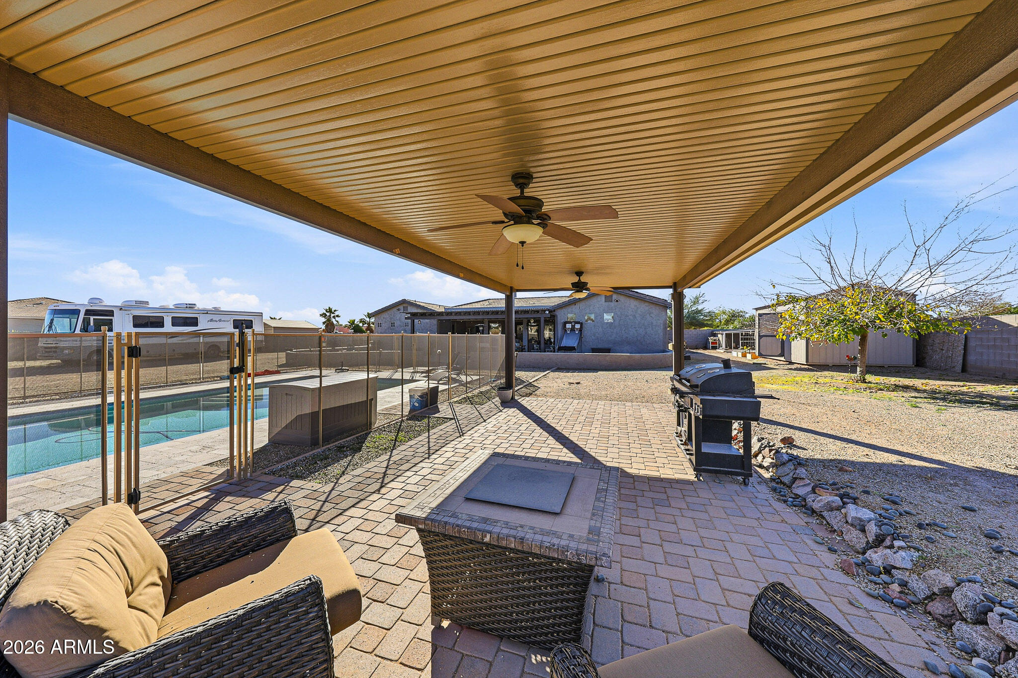 23024 West Sierra Ridge Way Wittmann, AZ 85361 - Photo 49 of 99 a view of a patio with couches chairs and a coffee table