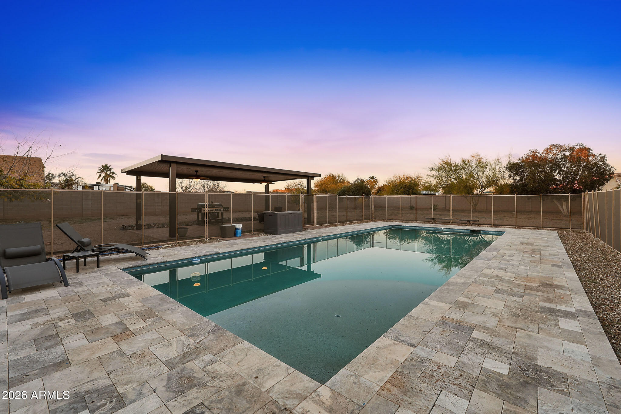 23024 West Sierra Ridge Way Wittmann, AZ 85361 - Photo 65 of 99 a view of swimming pool with a yard