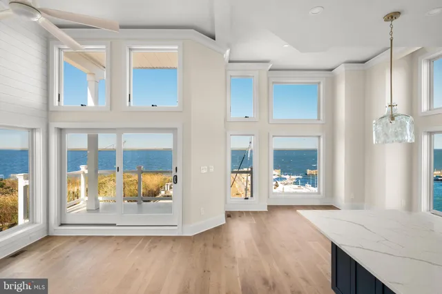 a kitchen with stainless steel appliances a stove and a microwave