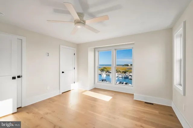 a view of a bathroom with a glass shower door