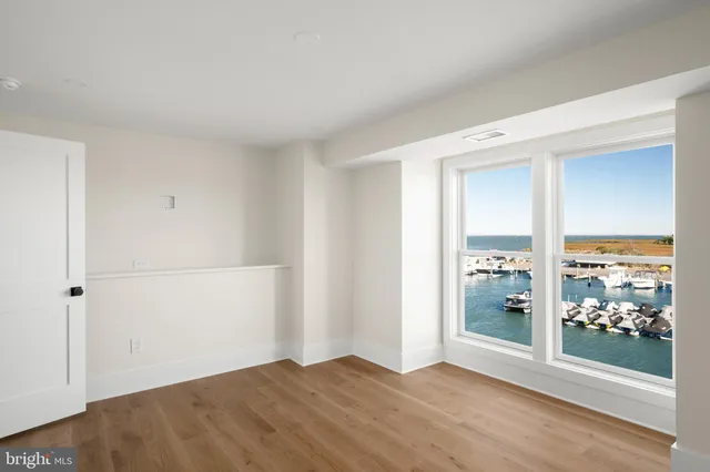 a view of a balcony with wooden floor