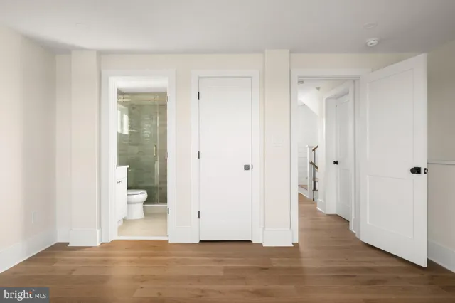 a view of a swimming pool with a table and chairs