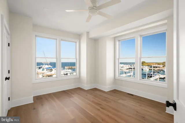 an aerial view of a house with a ocean view