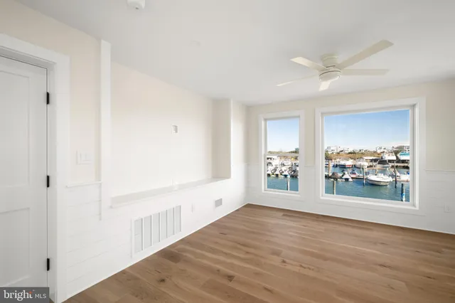 a view of a lake with building in front of it