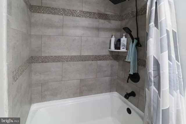 a bathroom with a bathtub