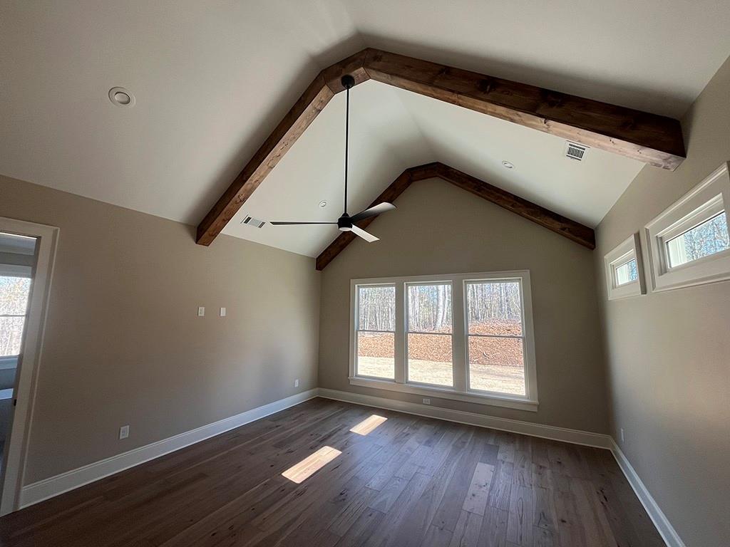 2200 Upper Burris Road Ball Ground, GA 30107 - Photo 56 of 79 a view of a hallway with wooden floors and a window